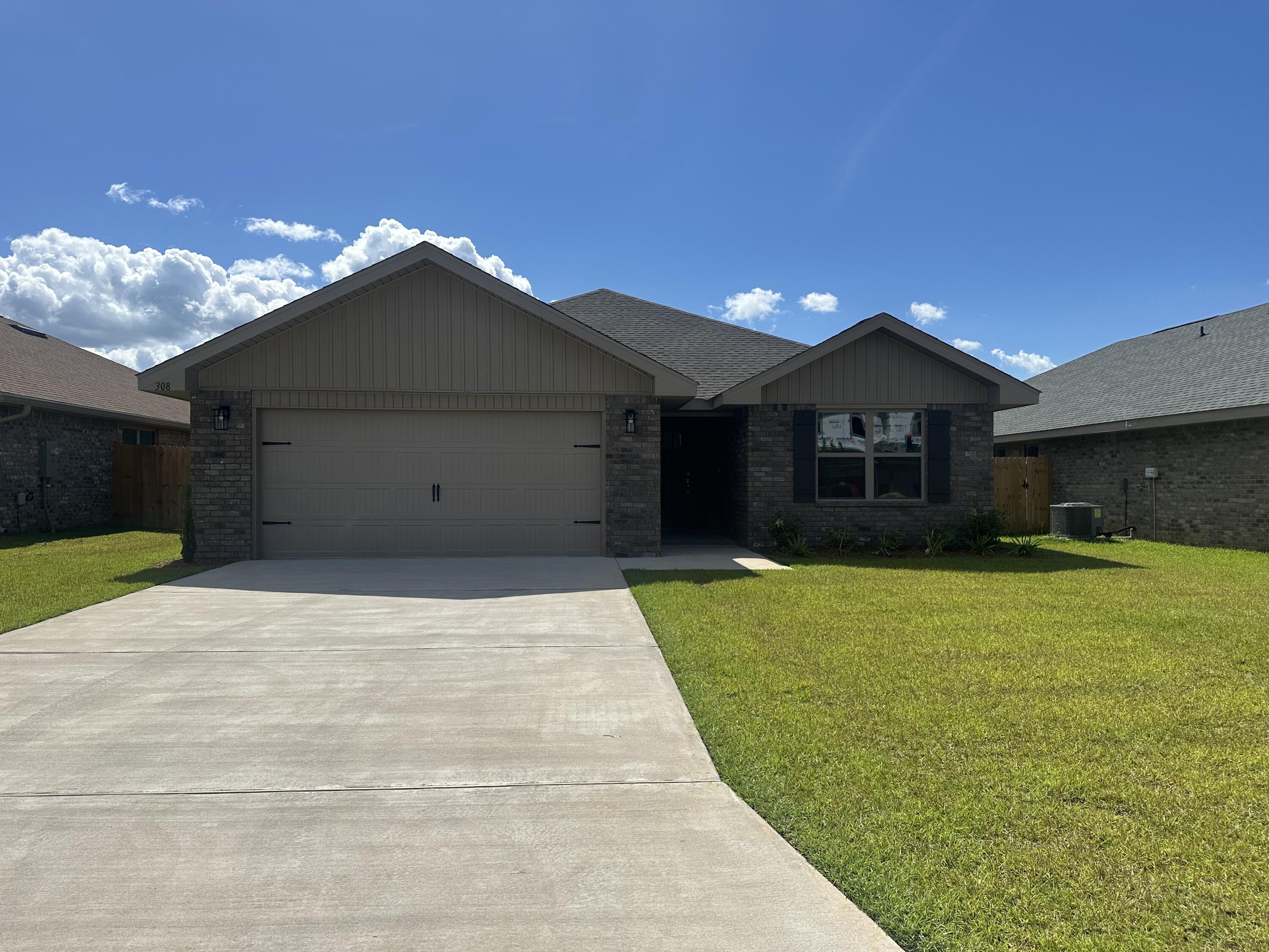 This is a 3 bedroom 2 full bathroom 4 sided brick home with a covered back porch. This home offers so much in just 1634 sq ft. The master bath has both a walk in shower and garden tub.All countertops throughout the home are granite. The kitchen is situated near the back of the home with an entrance to the back covered patio.You can also enter the back patio from the master bedroom. The kitchen has a spacious L shaped breakfast bar that overlooks the breakfast area and family room. This home has a very cozy layout. All floors are upgraded with durable LVP. Bedrooms have carpet. The entire lot is fully sodded with a professional landscape package. Sprinklers are on an auto timer. The garage comes with an automatic garage door opener. This home has a 10 year Bonded Builders Warranty