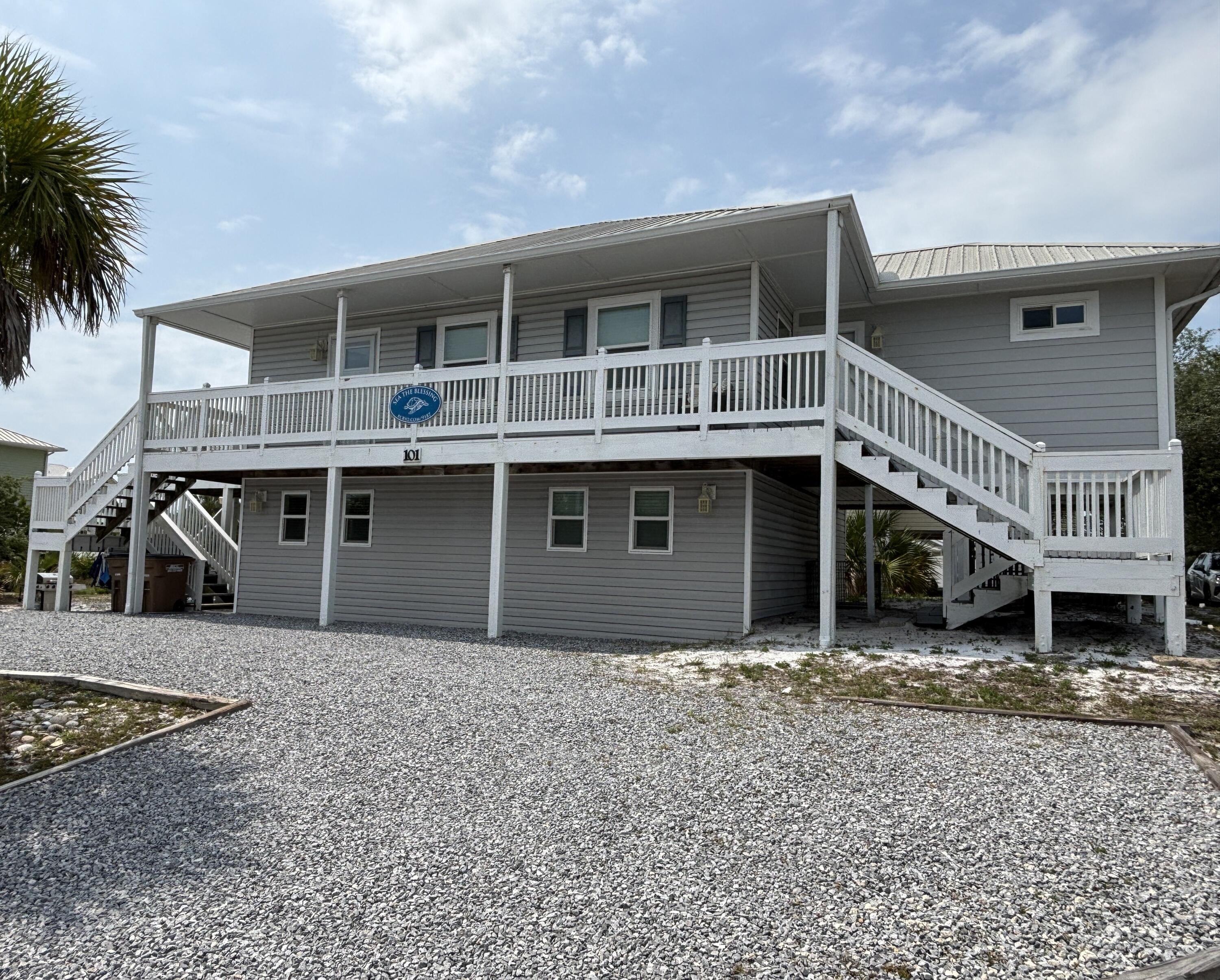 North Cape San Blas beach cottage located in the coveted X flood zone with ground floor suite. Fully furnished and turn key ready, this income producing was home was remodeled with the lower level added in 2021. Home is situated on a corner lot with plenty of room for beach toys, boat, open space or even a pool. GROUND LEVEL-Spacious covered porch and entertaining space of of the ground level leads into an open floor plan that consists of a great room with living area, dining area, mini kitchen, spare built in bunks, bedroom, full bath and laundry area in the hallway. This is a great and rare feature that gives the option of guests that do not wish to climb stairs. SECOND LEVEL- Has a large open deck facing The Gulf of America and has a peek-a boo view of the ocean. It also consists of a open floor plan with full kitchen with spacious cabinet/ counter space and bar, dining area and living area. There are 3 bedrooms on this level, two with their own baths and two with direct deck access. One will also enjoy the open feel of the beach because of a large window in the kitchen that has great views towards the beach as well as the open space of the westerly side of the property. Please take time to view the virtual tour that gives one the true flow of this amazing property. Located in the small subdivision of Turtle Dunes, home has dedicated access to the beach as well as a community pool just a short distance away. Also just a short walk to the Cape Trading Post, Weber's Donut Shoppe, and St Joe Shrimp Company. Measurements were obtained from the Gulf County Property Appraiser's office please verify if important.