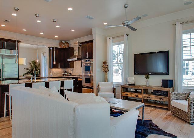 REDUCED & READY TO SELL! This impressive furnished home in Watersound Beach fronts a deeded greenspace & winding stream. Thurber Architecture designed a residence where no detail was overlooked. One immediately appreciates the multiple fireplaces, hardwood floors & skillful millwork of the trim, doors & cabinetry. The gourmet kitchen with Dacor appliances, granite countertops, double oven & custom cabinetry is a chef's dream. The kitchen, dining & living rooms have an abundance of natural light. The first floor master suite has vaulted ceilings & a multitude of windows. There is an intimate courtyard off the master bedroom with an outdoor fireplace and space for a pool. An additional master suite upstairs has a vaulted ceiling & its own private fireplace.