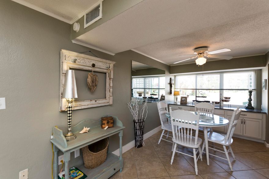 Seaspray is a fantastic beachfront gated condo complex right on the Gulf of Mexico. This charming 1 bedroom/ 1 bath beach ''cottage'' comes fully furnished in shabby chic flair (excluding 1 piece of furniture and a few personal items). The main floor boasts a generous kitchen/dining area that is open to the living room with open views of the courtyard. In 2011 the unit was renovated with new tile flooring, carpet upstairs, custom cabinets, granite countertops and new appliances. The owner also added a built in ''buffet'' area for extra storage and serving space. The bathroom was updated with a new vanity, granite countertop and extra storage above the commode. The complex is bordered to the east by a national park lending endless places to explore along the seashore. In the courtyard