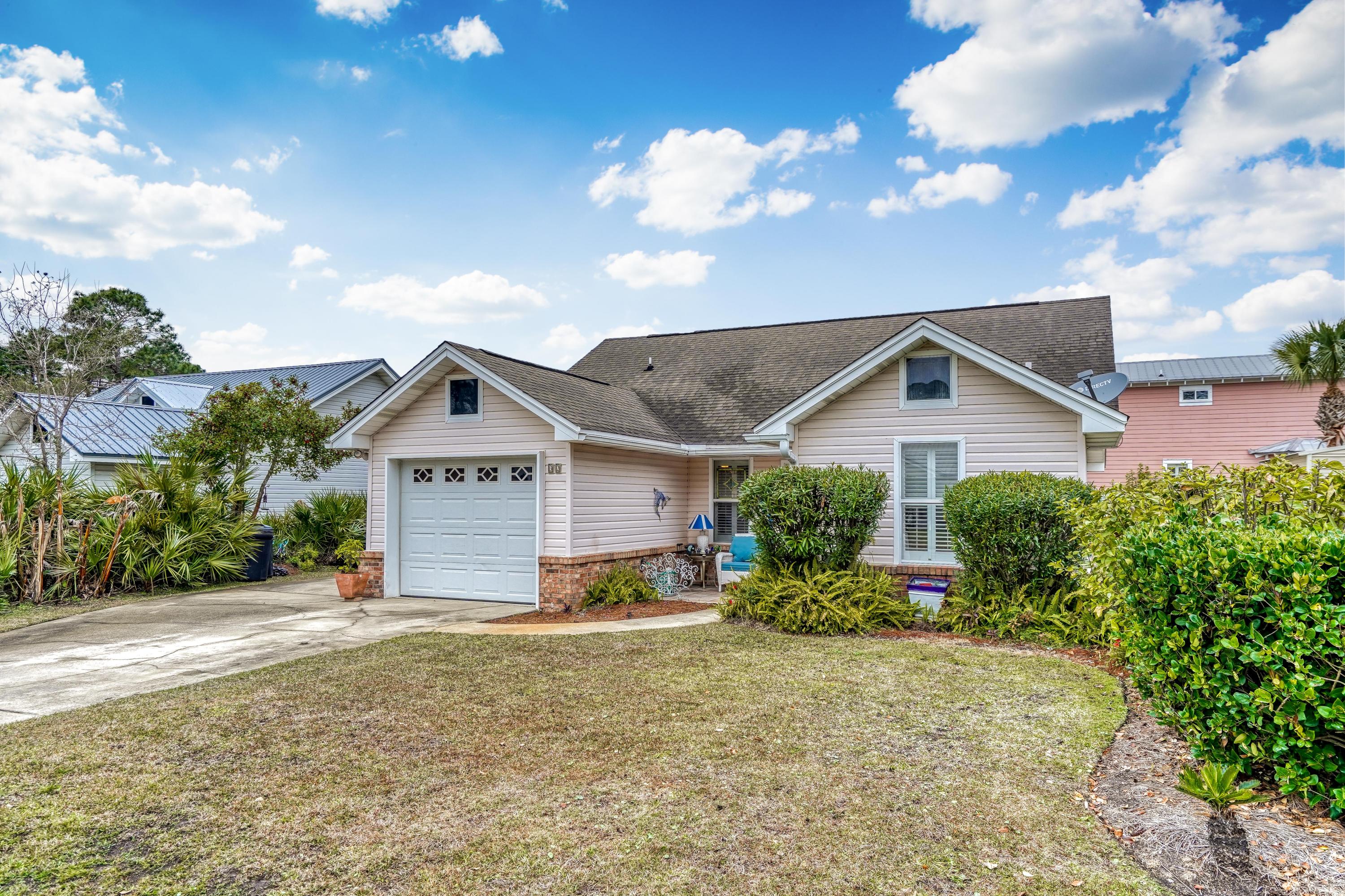This adorable home is located in the quaint neighborhood of Coco Park. Just steps away from the Choctawhatchee Bay public boat launch and Legion Park, with basketball court, playground and lovely picnic area. This home feels much lager than you would expect for it's size and has been well cared for. The kitchen, dining room and living room are all open and the master bedroom entrance is separated from the two additional bedrooms. It's truly a hidden gem in Miramar Beach. Coco Park has a total of 10 homes and only one road that ends at a cul-de-sac. Homeowners enjoy living in a small neighborhood, while still being right around the corner from Silver Sands outlet mall, several restaurants, and Sandestin Resort.