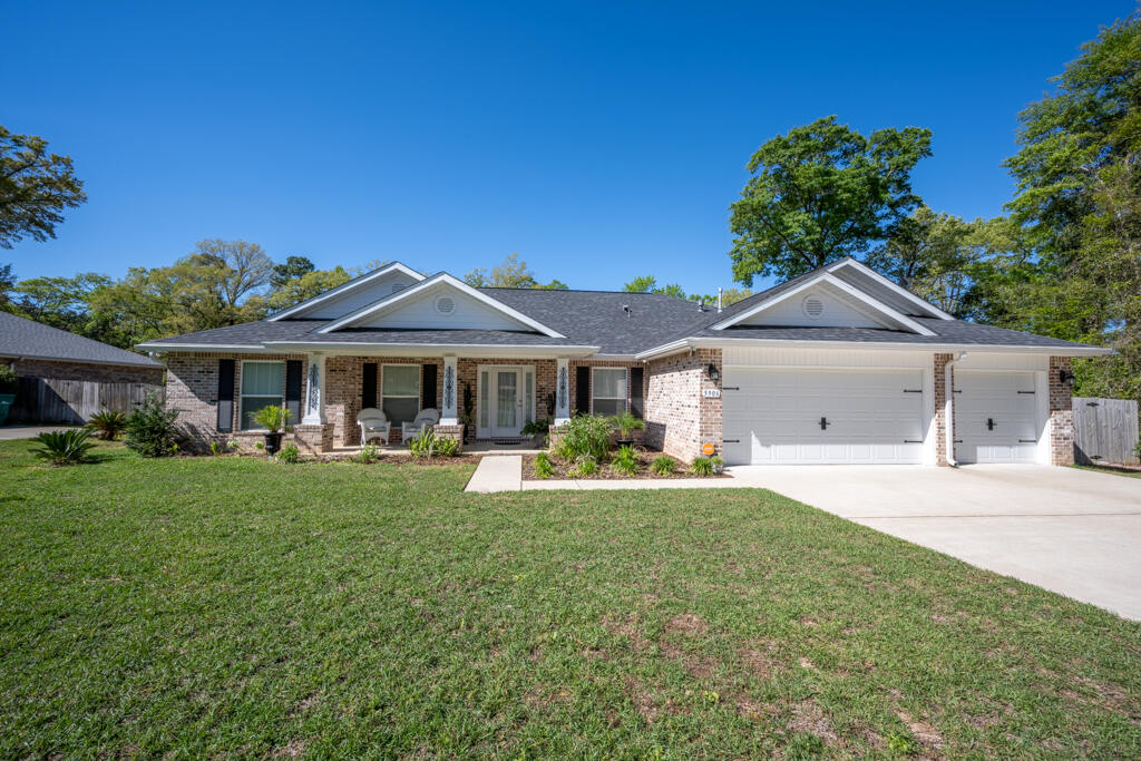 Welcome to 5906 Wind Trace Rd, Crestview, FL! Nestled in a serene neighborhood, this charming home offers a perfect blend of comfort and style. Featuring 4 bedrooms and 3 bathrooms, this residence boasts 2,634 of living space, ideal for families or those seeking room to grow. Enjoy modern amenities including split floor plan with a large family, living & dining Room and a 3 car garage. The family room has 10 Ft Ceilings and is open to the beautiful kitchen which is equipped with granite countertops, stainless steel appliances, 42 inch upper cabinetry and custom tile flooring. The master bath is nestled towards the rear of the home and features a tiled walk-in shower, tile flooring, separate soaking tub, double vanities & 2 walk-in closets and so much more!