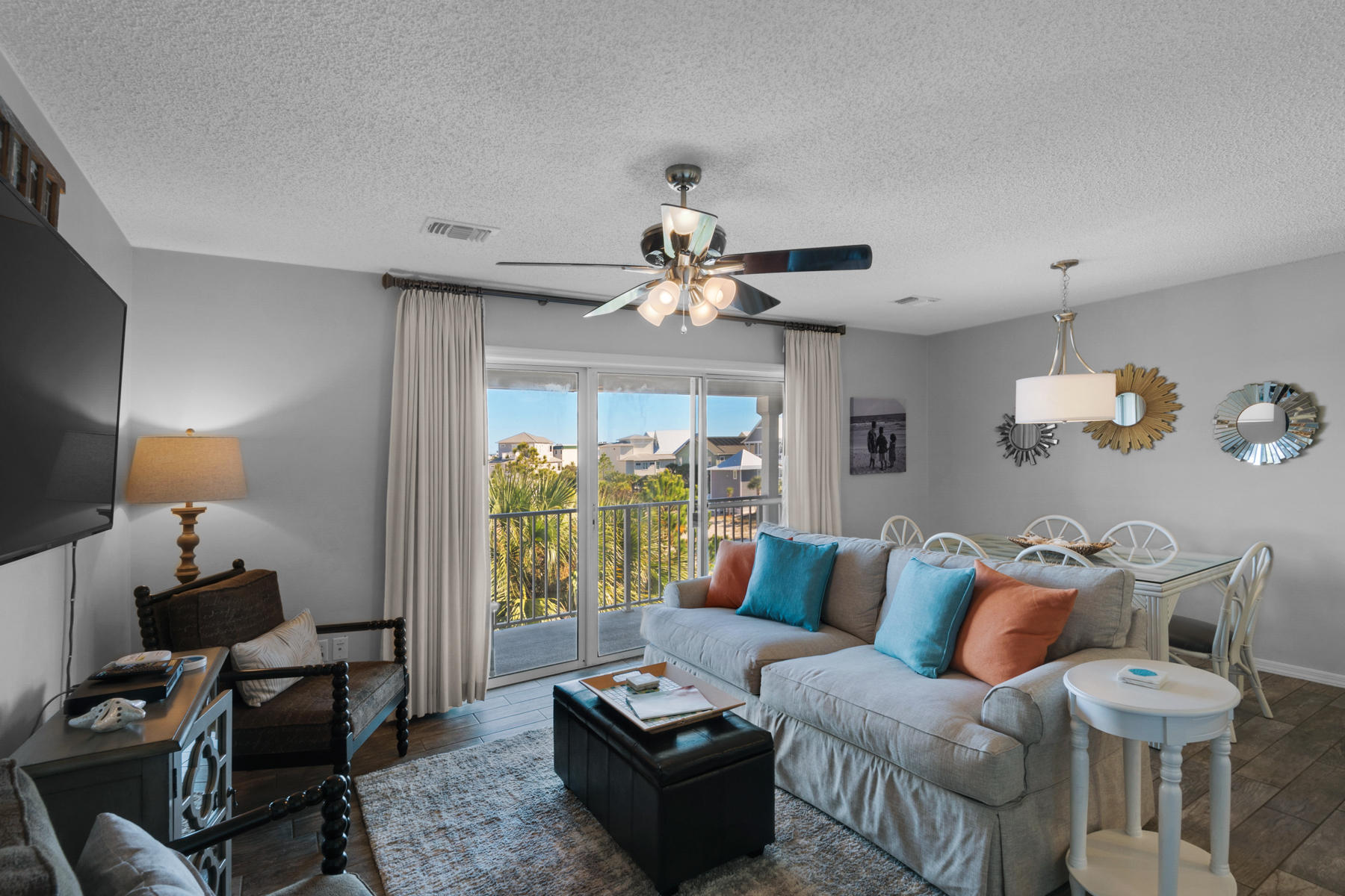 Looking for a reasonably priced 3 bedroom condo in the 30A area, with great beach access? You just found it! This 3 bedroom, 2.5 bath condo has been completely updated, boasting wood finish tile in the kitchen, living area and bedrooms, as well as granite countertops, stainless steel appliances and a tiled backsplash in the kitchen. The private balcony, which runs the length of the condo unit, is accessible from the living and dining area as well as the master suite. Two additional bedrooms and a jack-and-jill bath offer plenty of space for families. This unit is one of a few in the complex that also conveys with a large exterior owners' closet large enough to store bikes, chairs, beach toys, etc.. Beachside Villas amenities include two swimming pools, tennis courts, a shuffleboard court, and easy access to the sugar white sand beaches. Call today to see this gem!