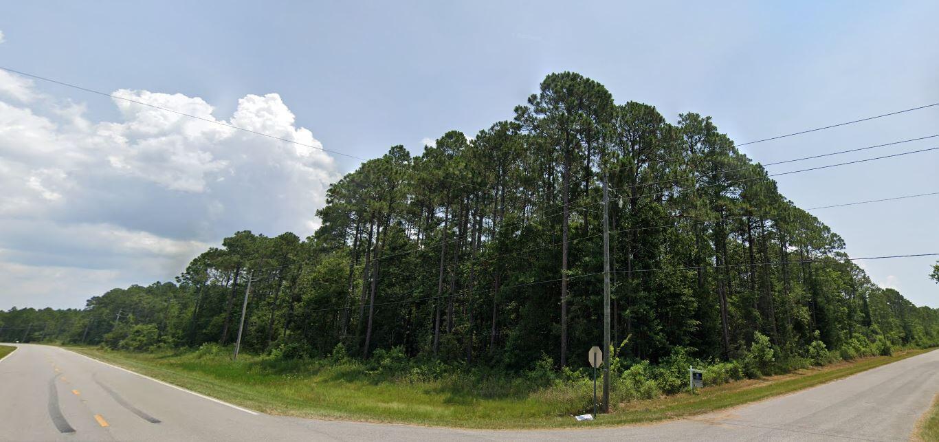 Great location! This is a piece of land on a corner, is more than half acre and walking distance from the east side of blackwater bay, 2 miles from Dickerson City boat ramp, only about 13miles from Pensacola beach and 21 miles from Navarre beach, This can be a great opportunity to build your dream home close to the Gulf coast.