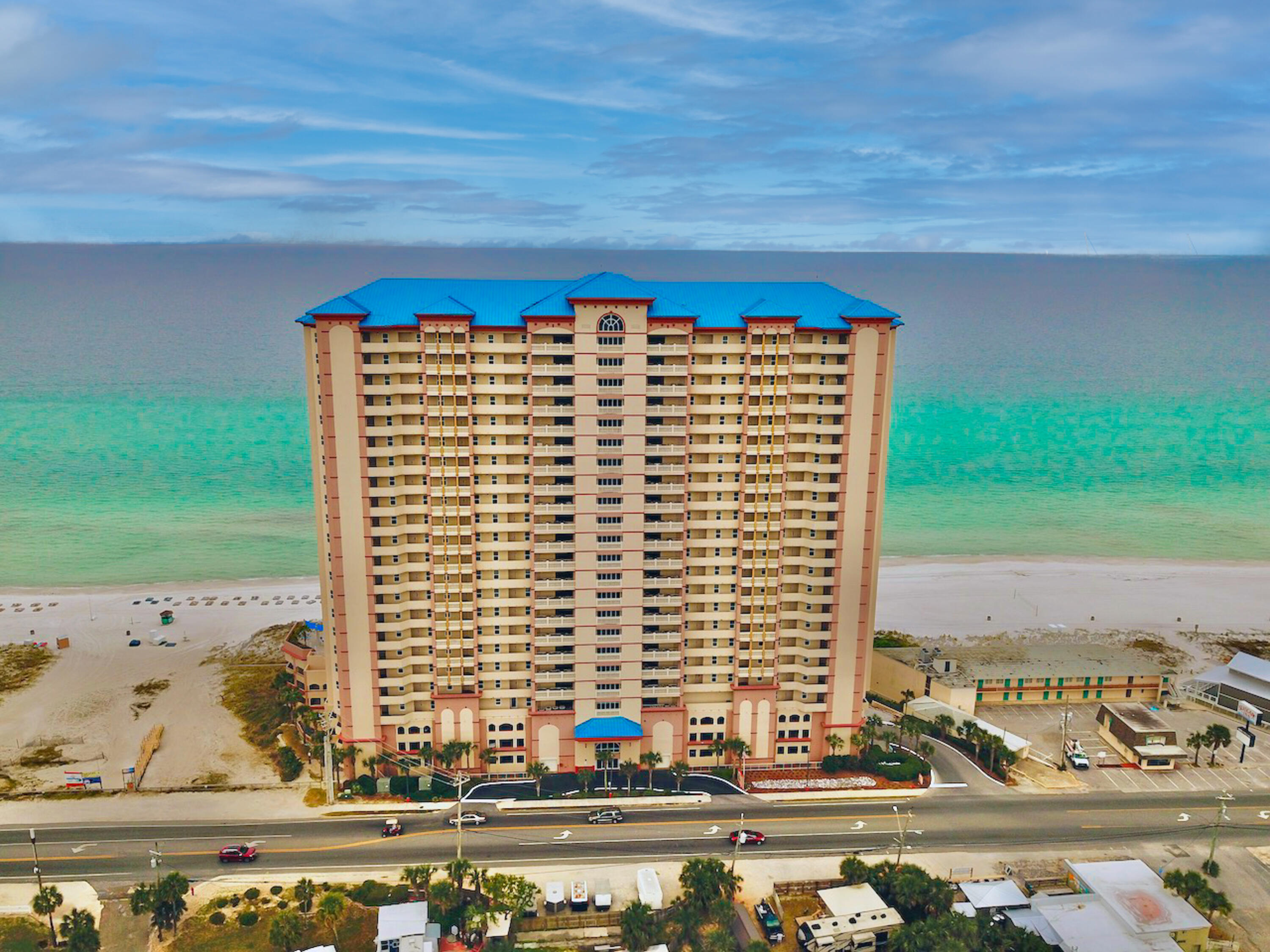 UNDER CONTRACT, SELLER ACCEPTING BACK UP OFFERS. Own your dream GULF FRONT condominium. Located in one of the most centrally located condo communities in Panama City Beach. Featuring two bedrooms, two bathrooms, plus, a BUNK ROOM, providing both spacious comfort and versatility. Immerse yourself in the coastal lifestyle. Condo comes fully furnished, boasting brand new carpeting and a track record of success as part of a thriving rental program, currently yielding approximately $40,000 in Gross Rents. The allure of this property extends beyond its well-appointed interior, as residents and guests alike can relish in premium amenities that define the epitome of beach side living. Picture yourself basking in the sun beside two pristine pools, one of which is seasonally heated! that offers breathtaking views of the Gulf of Mexico. Unwind in style with the inclusion of two inviting hot tubs, and revel in the convenience of a dedicated parking garage that eliminates the need to cross busy streets. Enhancing the outdoor experience, the property features grilling stations and a picnic area, inviting residents & guests to savor the joy of dining with family and friends. Maintain an active lifestyle with exclusive access to a well-equipped gym. For those seeking convenience, on-site restaurant...The Soggy Dollar Cafe adds a delightful touch, providing a perfect setting for socializing and enjoying refreshing beverages. Premier shopping, fabulous restaurants, live music, water activities and so much more, all a very short distance! This Gulf View condo not only promises a luxurious and comfortable living space but also offers an incredible investment opportunity with its lucrative rental history. Seize the chance to make this condo your own, where the panoramic Gulf views and an array of premium amenities await to elevate your lifestyle to new heights.

