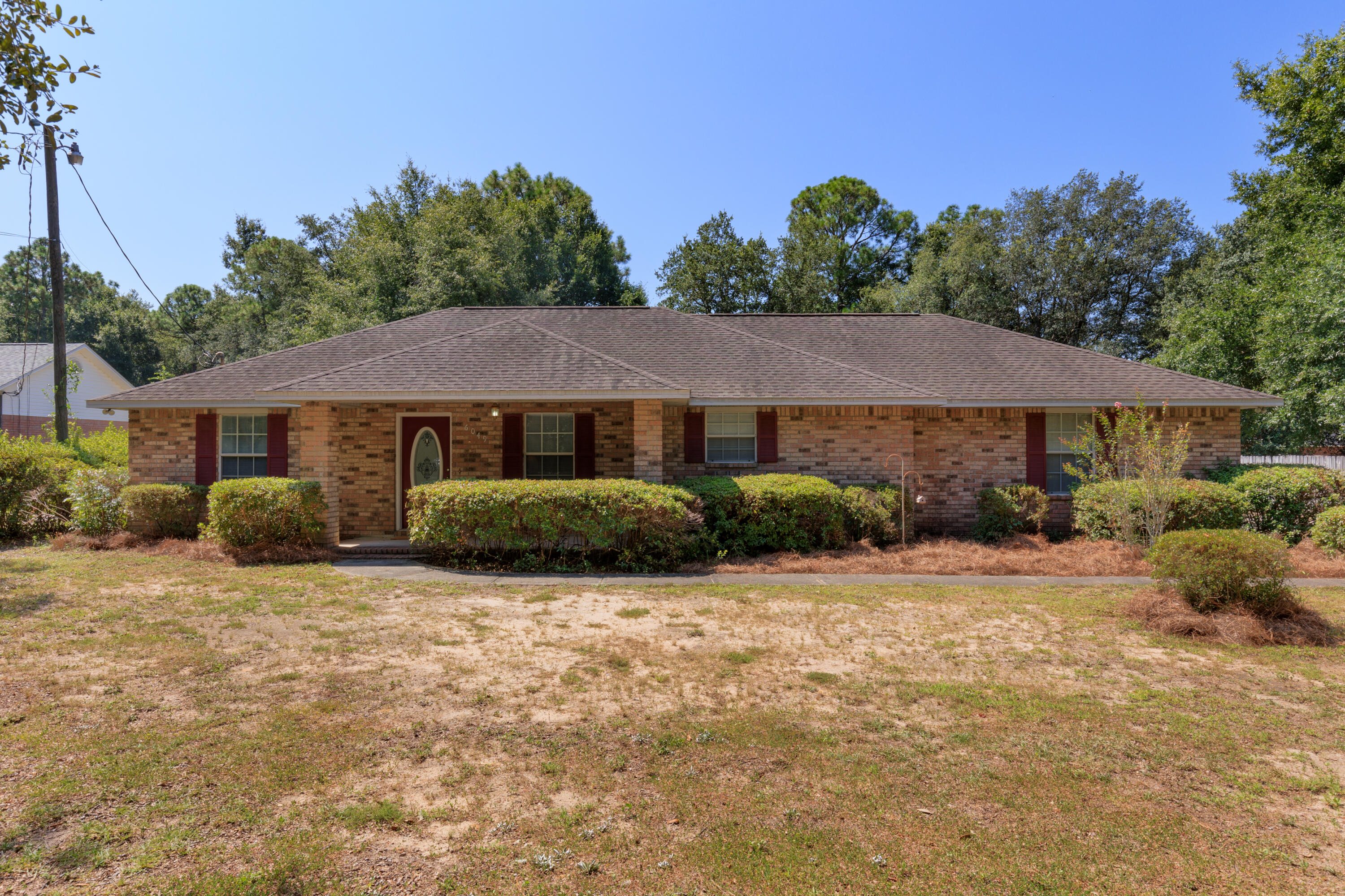 ake a look at this charming four-sided brick 2 bed, 2 bath dream home! Features include rocking chair front porch,  grand entry foyer with tile floors, huge formal dining room (could easily be used as 3rd bedroom/office/playroom), well appointed kitchen with tile floors, stainless steel stove, breakfast bar, walk-in pantry, and open concept oversized eat-in secondary dining area, living room with cozy fireplace, laundry/mudroom w/ ample storage space and utility sink, large primary suite with 2 walk in closets, en suite full bath w/ double sinks, and garden tub/shower combo, generous size secondary bedroom and hall bath w/ tub/shower combo await on the opposite of side of the home in this well laid out split bedroom floor plan, attached oversized garage w/ storage area, back patio leadin
