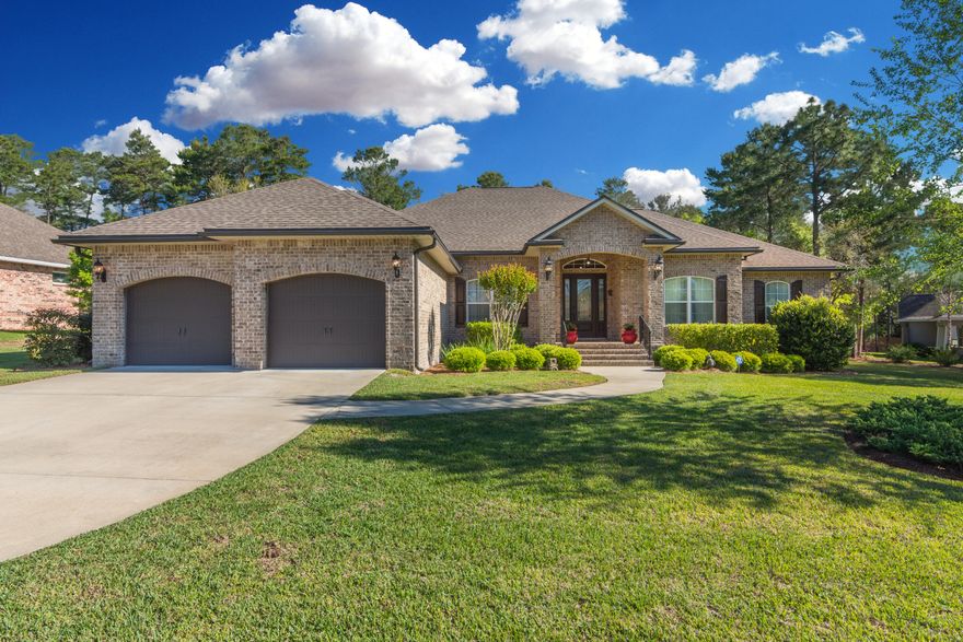 Beautiful custom built all brick home located in Swift Creek. Located on a large flat lot, beautifully landscaped, privacy fencing, & large enough for a pool. Once you walk into this home you will fall in love. With the elevated ceilings, lots of nature light, hurricane high impact windows, granite counters, top end appliances, cherry wood 42 inch cabinets, tigerwood floors, split bedrooms, and two covered porches (front and back). This home also offers a family room and large media room as well as a dining room & 4 bedrooms. 4th bedroom is made to be a flex room in case you want a office. Luxury master suite. with built in cabinets in the master bedroom and in the master bathroom is a large walk in closet, dual sinks, garden tub and incredible walk in shower with two shower heads.