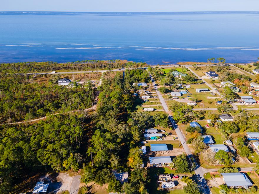 Escape the rat race and build your own little piece of paradise at The Reserve on Saint Joseph Bay. It's currently the only homesite available in Port Saint Joe's newest subdivision, making it rather special. The generous 1.75-acre lot has superb views of the sheltered bay waters and is almost double the size of comparable lots along Constitution Drive/Highway 98 for the same price. This lot offers huge potential for a lifestyle of enjoying sunsets across Saint Joseph Bay. The wooded lot has ample space for a private pool, garage, carriage house and/or outbuildings to accommodate all your hobbies. It's a dream location for any outdoor enthusiast or beach lover, with miles of soft white sandy beaches nearby.