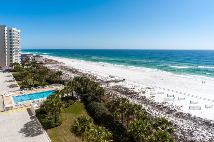 Rare opportunity! Luxurious west corner condo in Oceania Condominiums located on the sixth floor includes fabulous upgrades throughout! Large west end unit includes 2,380 square feet of living area with a 40 foot balcony facing the gulf with 60' of glass across the gulf side of the condo! Wonderful views of the beach can be enjoyed from the entry foyer, great room, dining area, kitchen, and master bedroom. The north side of the condo includes two guest bedrooms with access to a second balcony overlooking the harbor. Condo has only had two owners to date and has never been on a rental program. However, the condo is rental capable. Condo is in mint condition! The Oceania development includes 574' private beach for only 71 condos along with a lovely pool area. Condo includes covered parking