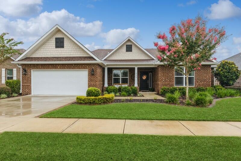 Immaculate inside and out, must see spacious all brick home offering over 2,600 square feet of living space, featuring 4 bedrooms/ 3 bathrooms plus designated dining room AND office (or can be technically considered a 5th bedroom)! You will love the upgrades that set this home apart from all the rest! In addition to the thoughtfully hung wainscotting and shiplap throughout the home, updated light fixtures throughout create the inviting warm ambiance and coastal flair.The kitchen provides many upgrades such as gas range w/hood vent, stainless steel appliances, single basin sink, under cabinet lighting that illuminates the backsplash, and expansive quartz countertops. The open concept floor plan creates a seamless flow between the living, dining, and kitchen areas, complemented by luxury vinyl plank flooring in all main living areas as well as the primary bedroom.
The primary bedroom is well-appointed, offering a comfortable and private retreat. The additional 3 bedrooms provide flexible space for guests, or other uses. The three-bathroom configuration ensures convenience and privacy for residents.
The living room features a cozy fireplace nestled amongst custom shelving and cabinetry, while the designated dining room offers a dedicated space for meals and gatherings.
Exterior highlights include a large fenced-in yard with a circular concrete pad to host guests around the firepit , meticulously maintained mature fragrant landscaping, a covered front porch in addition to the spacious covered back patio for grilling and entertaining, as well as a two-car garage with a 4-foot extension, providing ample storage or workspace. The lot size is approximately 0.21 acres, providing ample outdoor space. Vinyl hurricane shutters numbered for each window for easy installation included.
Hammock Bay is a premier, bayfront master planned community located just 15 minutes north of the white sand beaches of the Emerald Coast. Within the confines of the neighborhood is a 6,000 square foot clubhouse that offers residents use of the movie theatre with auditorium seating, a full caterer's kitchen to include wet bar and dining area, childs play room, and lounge overlooking the lake and pool area. Numerous on site workout and fitness facilities, competition lap pool, additional 3 Resort-style pools, pickleball courts, tennis courts, basketball court, a putting green, large playground, outdoor kitchen/gas bbq areas, surround the club house and pool making it an outdoor haven for the whole family to enjoy harmoniously. Sprinkled throughout the community are multiple catch and release stocked ponds, dog parks, both paved and primitive walking trails, General Store and Brewery, an additional bay front club house with fishing pier extending 500' in to the bay, an amphitheater like stage with jumbotron screen, with lots more on the near horizon! All residents at Hammock Bay will enjoy year-round social events as well as a vibrant and active Town Center. Consider this an invitation to experience the Hammock Bay Lifestyle by contacting me today for an updated list of this months community events calendar!