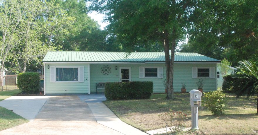 This charming 4 Bedroom 2 Bath home sits on a large corner lot in the heart of Fort Walton Beach, with an updated kitchen that has granite countertops and a Breakfast Bar and beautiful flooring throughout. The house has new windows all around and they are impact resistant. It is just down the street from the new Stillwell Park and Playground, perfect for a family with kids. This large corner lot has a well kept landscape with fruit trees and several out buildings including a workshop/detached garage equipped with electricity. There is a lot of room for lawn equipment in the 2 lawn sheds and a fully fenced back yard. Furniture does not convey. Buyer to verify all information and measurements.