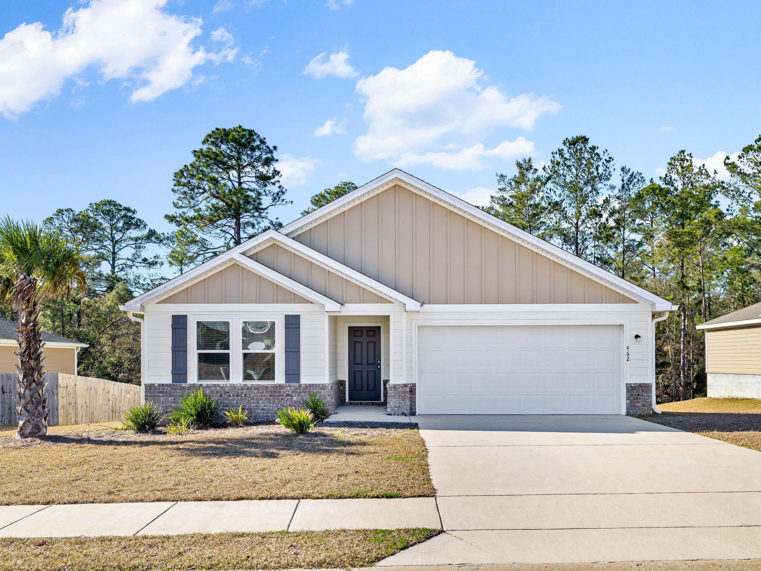 Discover the charm of Cross Creek Estates, where this beautifully crafted four-bedroom, two-bathroom home offers a harmonious blend of privacy and modern elegance. Set against a tranquil woodland backdrop, this residence provides a serene retreat from the every day while being just moments from community amenities. With 1,762 square feet of thoughtfully designed living space, the home is a testament to contemporary style and comfort. The open-concept layout creates a natural flow between the living areas, anchored by a chef-inspired kitchen featuring sleek granite countertops, stainless steel appliances, and crisp white cabinetry. Just beyond the kitchen, a private deck invites you to bask in the quiet beauty of the wooded surroundings, perfect for morning coffee or evening gatherings. Only four years old, this home feels fresh and inviting, with every detail meticulously maintained.
The neighborhood enhances the appeal, offering a community pool and playground where neighbors gather and memories are made. Whether you're a first-time homebuyer, a family seeking space to grow, or someone longing for a peaceful retreat, this property offers a rare opportunity to combine privacy, style and value.