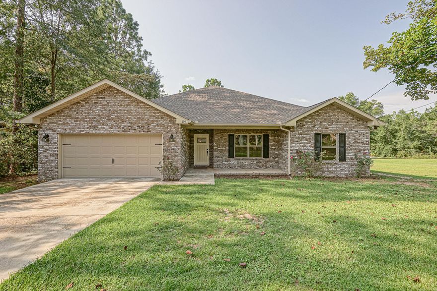 Welcome home to 195 Ridge Drive!  This like-new home was built just 3 years ago and features wood look tile floors throughout the home. Wall to wall carpeted bedrooms for comfort. Trey ceilings in Master bedroom and Living room give you a spacious area to lounge in. Breakfast bar/kitchen island is adjacent to the Living Room in this wide open floor plan making it easy to entertain audiences. Kitchen has granite counter tops, stainless appliances, and gorgeous cabinetry. Large closets throughout home for extra storage space. Bathrooms, kitchen, living room all feature recessed lighting! Call to schedule your showing today! This sale also contains the lot for 193 Ridge as well.