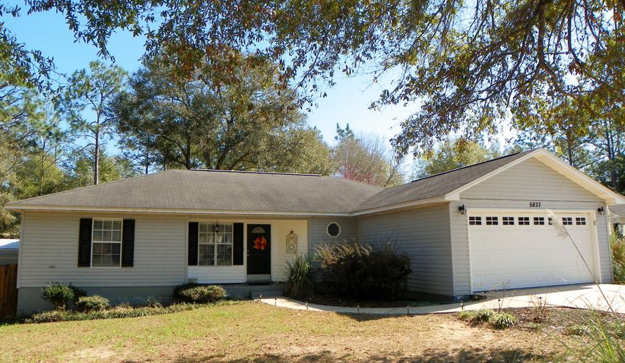 Move-in ready home on 0.41 acres! Seller offering 1 yr Home Warranty! 3/2 split Bedroom has lots of living space and storage! Large Living Room with high ceilings wired for built in speaker system. More then enough room for your furniture! Beautiful Kitchen has black distressed cabinets with breakfast bar that opens to Dining Area. All Kitchen appliances stay (most purchased in 2015/2016), including front loading Washer and Dryer (2012)! Master Bedroom has great dressing/work area and walk-in closet. Additional Bedrooms offer lots of space off of Living Room. Enjoy large back yard, property extends past privacy fence! Covered back patio is a great space to relax, room for those rocking chairs! 20x8 Yard Building (2015, wired for lights, two doors at each end) conveys,extra outdoor storage!