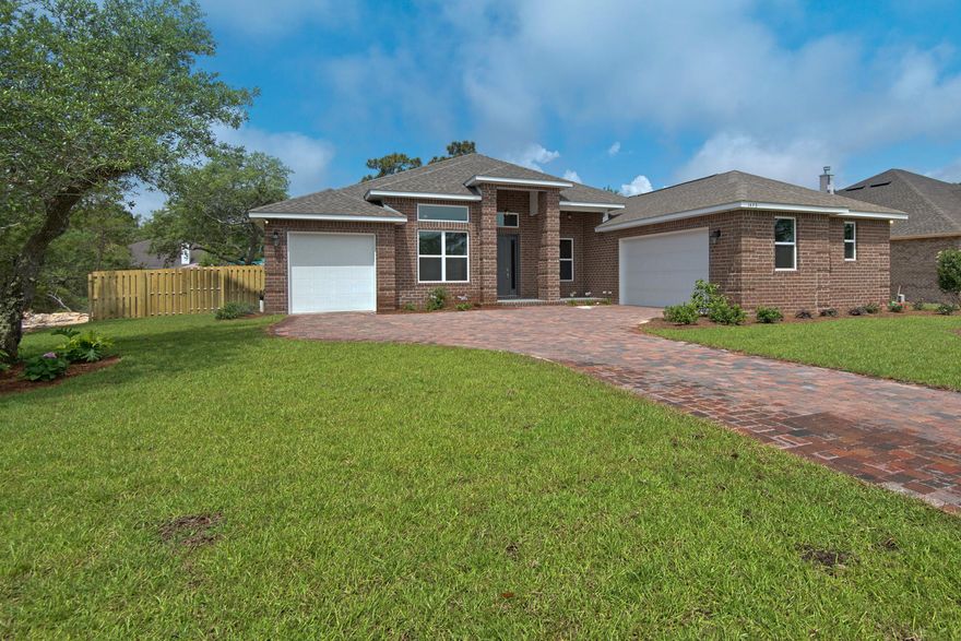 Ready Now! The AUGUSTA offers 3128 SF with 4 spacious bedrooms, 3 full baths, and a 3 car garage. As you pull up to the home, you'll immediately notice the beautiful paver brick driveway and sidewalk, as well as the premium estate-sized brick covering the home. Once you enter from the covered front entry into the oversized foyer, you'll immediately notice the incredible 12' ceilings that continue throughout the main living space. To your left, you'll see your den/office space, and to your right you'll see your spacious dining room. As you continue into the great room, you'll see the beautiful 12' coffer grid ceiling with beautiful 7.25 crown molding and beautiful French doors leading out to the oversized covered lanai. Just off the great room, the open 7.25 crown moldin