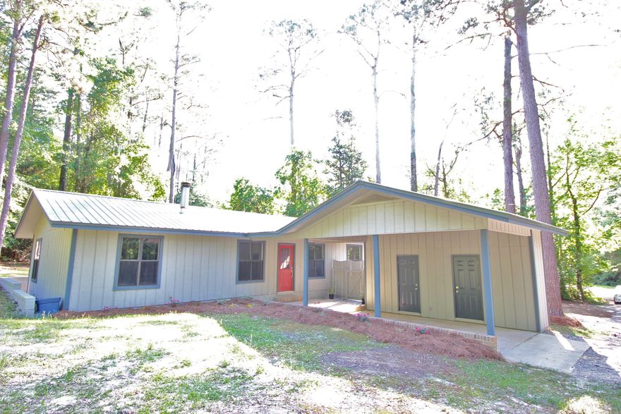 Completely renovated inside & out! This perfectly appointed home has 3 bedrooms, 2 baths, located beautifully just inside Teelinville on a very private lot, completely surrounded by trees. Brand new handscraped hardwood flooring, all new kitchen cabinets in popular shaker style, new counters & tile backsplash and stainless steel appliances & pantry in the kitchen. Gorgeous floor tile in kitchen and baths and new carpet in bedrooms. Brick fireplace flanked by built in bookcases make a great first impression for guests and can be seen from all common areas. Solid surface countertops in bathrooms. Carport area has 2 separate secure storage areas and new lush landscaping. New metal roof & HVAC. Great starter home or downsizing families or singles. This one will charm you so act quickly!