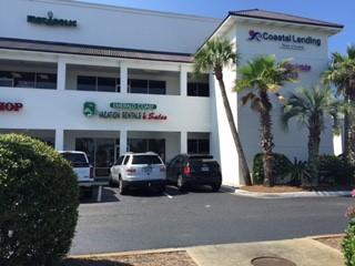 **PRICE REDUCTION** Un-Believable-Buy! Balcony-view right outside your office door! This second floor lovely built-out professional office/retail space,3 work-space offices, conference room, Large kitchenette and break-out room, storage and private restroom. All the amenities of class-A Ownership on frontage Hwy 98, complete with elevator and private back stairwell to parking. Holiday Plaza hosts a busy tenant mix with plenty of front drive-up customer parking for retail/office and restaurants.This Plaza is newly upgraded with paint, new signage, parking-lot resealed and new landscape. All making Holiday Plaza the most desired place to work, shop and dine.**Own as an income Investment now and occupy later if desired. Unit currently holds leased Tenants and lease will convey with sal