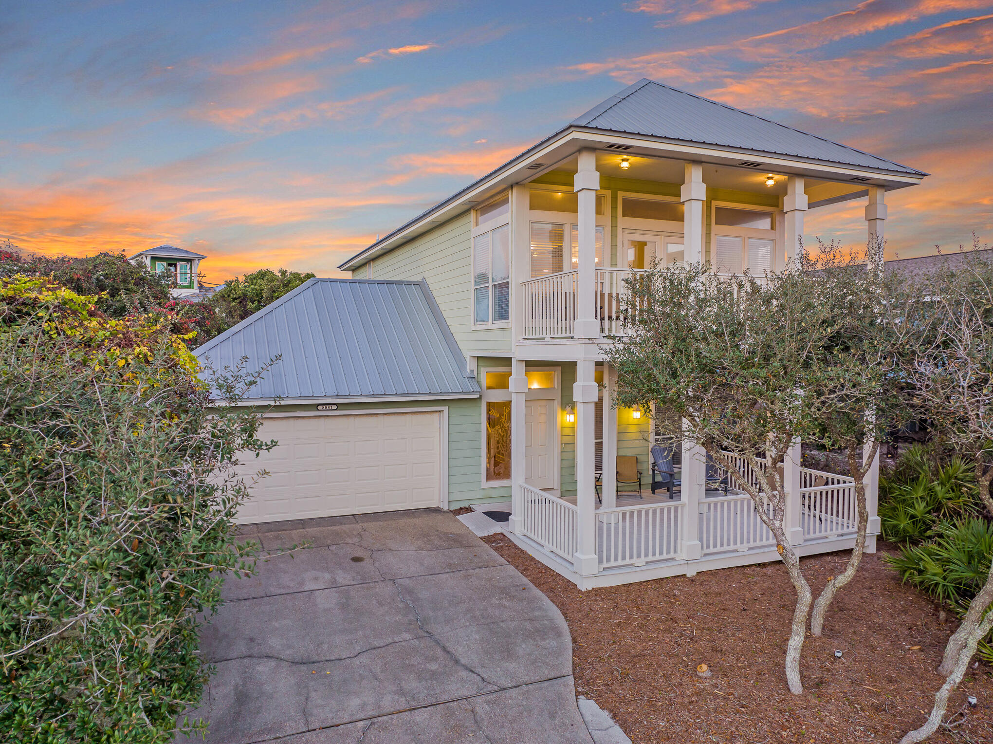 Nestled on 30A's coveted east end directly on Scenic Highway 30A in Seacrest, this impeccable 3BR/2BA beach cottage with private swimming pool and deeded beach access is the perfect base for all of your beach adventures or the inspiration for your development dreams with a large lot with potential for expansion. A reverse design plan maximizes the phenomenal views of the gulf available from the second floor living area and covered balcony. Natural light pours into the open concept living and dining area centered around a gas fireplace with beautiful hardwood floors and 10' ceilings. The kitchen offers a breakfast bar, stainless steel appliances, ample cabinetry, and a travertine backsplash. The spacious master suite is also located on the second level with an ensuite bathroom. On the first