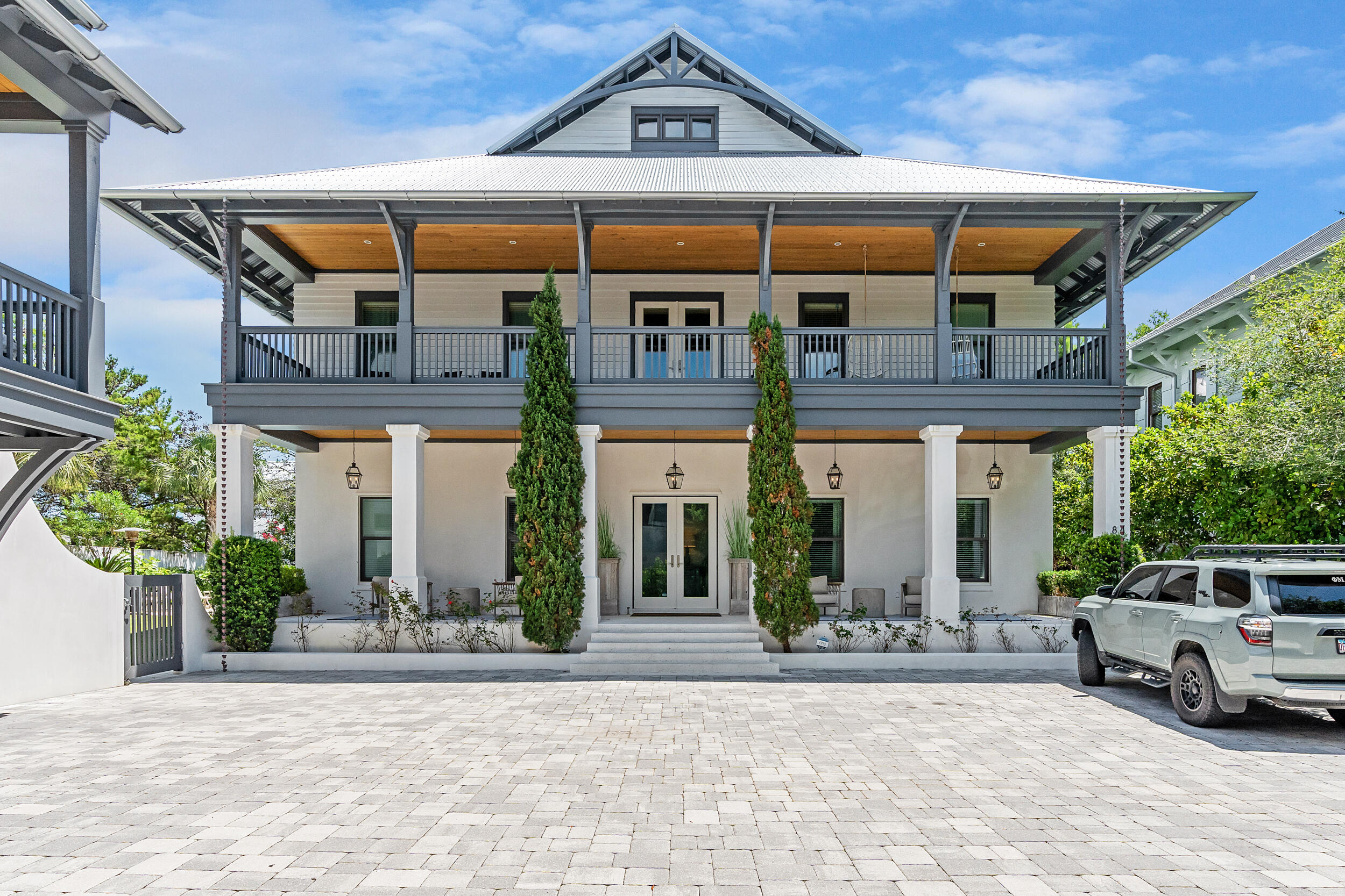 A Rare Coastal Sanctuary in the Heart of 30A.Welcome to 84 Pinecrest Circle, an exceptional luxury estate tucked within a private gated enclave just steps from the Gulf of Mexico. Situated on an expansive triple lot, this one-of-a-kind property offers privacy, space, and timeless elegance--never before listed and never used as a rental, presenting a pristine opportunity for discerning buyers.This 6-bedroom, 6.5-bathroom retreat features ensuite baths in every bedroom, a bright, open-concept floor plan, and abundant natural light throughout. The like-new home showcases refined coastal finishes, soaring ceilings, and seamless indoor-outdoor living designed for effortless entertaining.Outdoors, enjoy your private pool, lush landscaped grounds, and an expansive entertainment area p