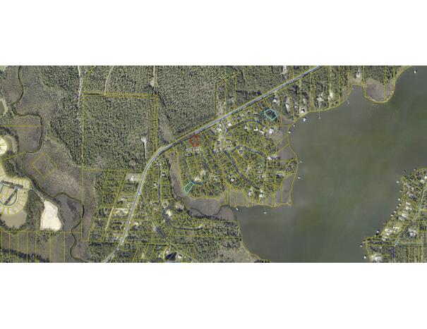 Build your family home or vacation get away, no HOA fees.. Lot is very near Freeport Marina and Regional Sports Complex in booming Freeport Flood Zone AE with flood insurance required with financing. Walton County Planning states that the rear 25 feet of the lot must remain in its natural state (no clearing permitted at the rear of the lot.)