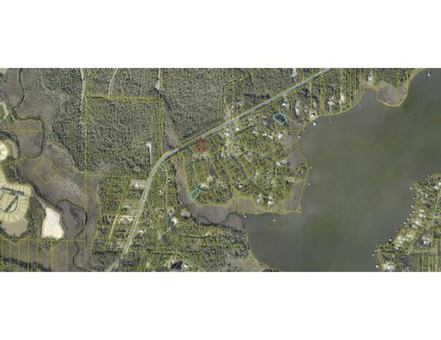 Build your family home or vacation get away, no HOA fees..  Lot is very near Freeport Marina and Regional Sports Complex in booming Freeport  Flood Zone AE with flood insurance required with financing.  Walton County Planning states that the rear 25 feet of the lot must remain in its natural state (no clearing permitted at the rear of the lot.)