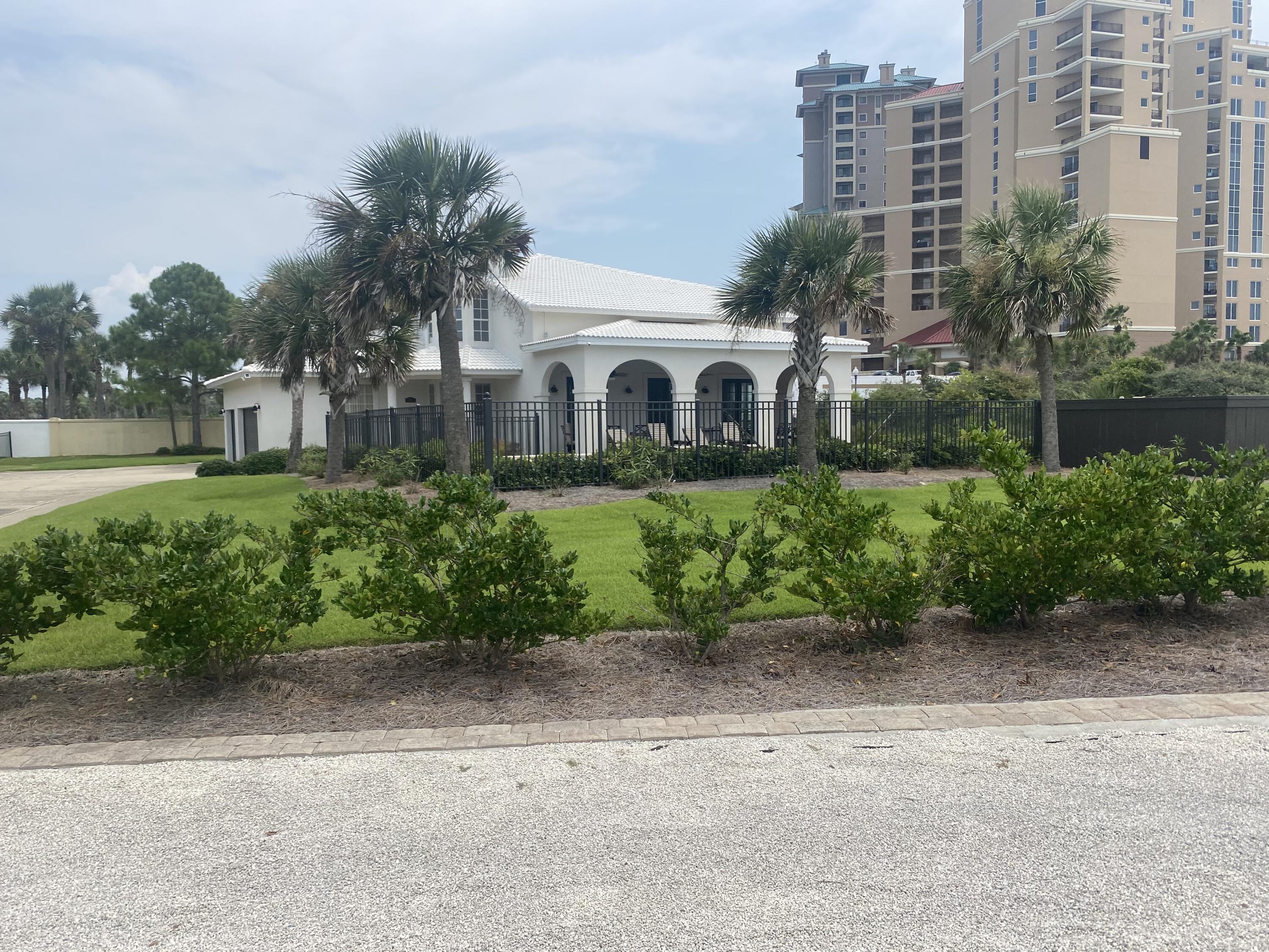 Come take a look at this lovely Mediterranean home in the Gulf-front neighborhood of Gulf Pines. This one of a kind, two story home is located just a short walk or golf cart ride away from the white sandy beaches of the Gulf of Mexico.  This beautiful home was renovated and totally remodeled in 2017 and can be yours as a investment property or your new family home.  Come share with just a few neighbors, your own 300 ft deeded beach access called Taj Mahal.   The Taj Mahal was created by this neighborhood years ago and still remains the best place on the beach to relax and enjoy the company of family and friends.Gulf Pines is a hidden jewel.  Don't miss out on this opportunity to own a piece of the Emerald Coast.