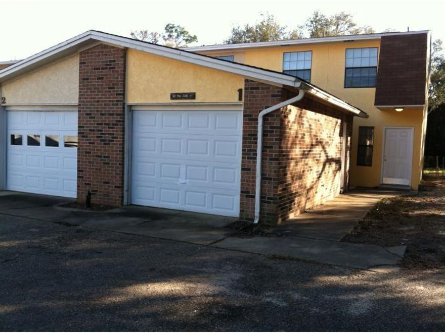 RARE FIND!!!!! This 3 bed 2 1/2 bath plus 1 car garage and laundry room in the heart of Shalimar is absolutley a must see!!! Tile throughout downstairs.Three bedrooms upstairs with two full bathrooms upstairs and 1/2 guest bath downstairs. TONS and TONS of closet space throughout this entire townhome. Fenced back yard with open patio. Great for first time homebuyers, small families, or investment.Corner unit so extra space on yard and parking. Compare to similar townhomes in Shalimar, you will see that this is definately a GREAT BUY!