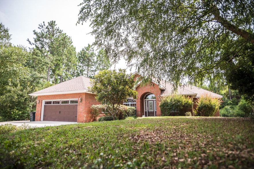 Beautifully maintained, all brick, Deerpoint Lake area home. Located on a quiet cul de sac and only one block to the lake! As you walk inside you are greeted with a spacious and oversized family room, with surround sound, perfect for entertaining. Large ceramic tile and hardwood floors are throughout. The kitchen opens to the family room and boast custom cabinets, granite counter tops and stainless appliances. There is not only a breakfast bar, but also a large breakfast area that overlooks the backyard. The home features a split bedroom floor plan with 3 bedrooms plus an office. Outside you can enjoy an oversized garage, extra driveway space and a exceptionally maintained, one acre lot.