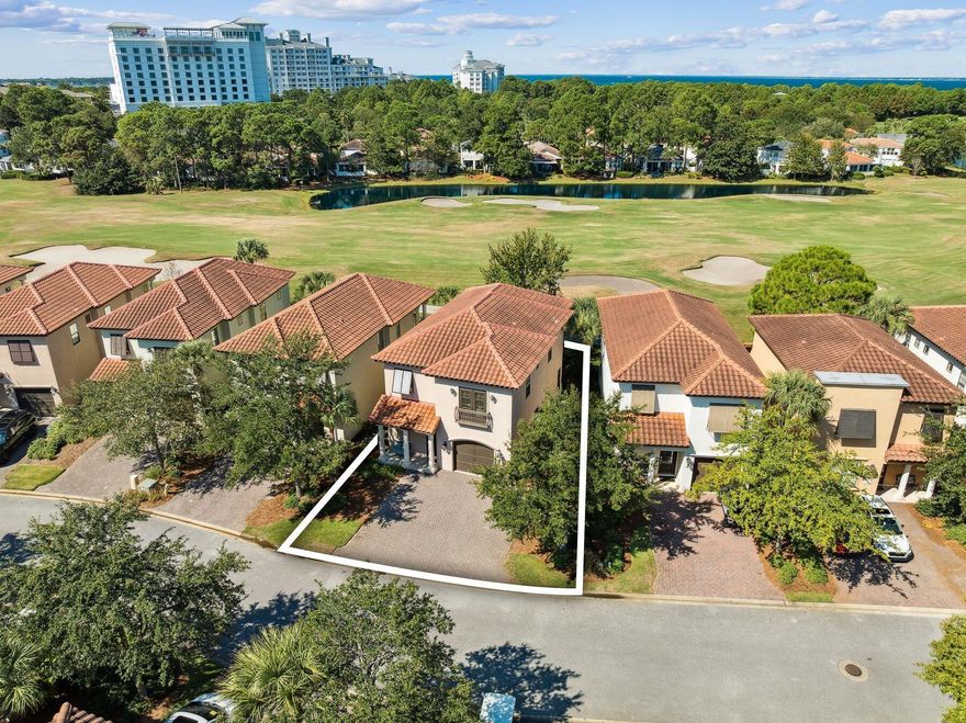 Experience refined coastal living in this beautifully appointed and fully furnished three-bedroom, three-and-a-half-bath home located in the sought-after Villa Lago neighborhood of Sandestin Golf and Beach Resort. Perfectly positioned fronting the Baytowne Golf Course, this professionally decorated two-story residence offers timeless style, comfort, and convenient access to all the amenities of the resort lifestyle. The spacious main level welcomes you with travertine flooring, crown molding, and granite countertops throughout. The gourmet kitchen is equipped with stainless steel KitchenAid appliances, a breakfast bar with seating for four, and a dining area for six, ideal for entertaining. The spacious living area opens to a covered back porch with seating and a propane grill, ideal for relaxing or entertaining. Set along a premium homesite, this porch enjoys tranquil golf course views and a rare sense of privacy with no neighboring porches directly in sight. Additional features include a half bath, owner's closet, an oversized one-car garage with additional room for the included four-seater golf cart and ample space for beach gear, and an expansive driveway with three parking spaces. Upstairs, each of the three bedrooms offers a private ensuite bath for optimal comfort and privacy. The primary suite features a king bed, dual vanities, an oversized soaking tub, deep walk-in shower, and a private balcony overlooking the fairway. The guest suite includes a queen bed and floor to ceiling windows, while the third bedroom provides two twin bedsperfect for family or guests. A laundry room and additional walk-in owner's closet complete the upper level. Nestled between serene water features and the Baytowne Golf Course, Villa Lago residents enjoy access to community pools, tennis and pickleball courts, multiple golf courses, and all the exclusive Sandestin Resort amenities. Conveniently located within walking distance of The Village of Baytowne Wharf and just a short bike or trolley ride to the white-sand beaches of the Emerald Coast, this home offers the perfect combination of relaxation, recreation, and resort-style living. Ideal as a primary residence, vacation retreat, or rental investment, this Villa Lago property captures the best of the Sandestin lifestylewhere everyday living feels like a getaway.
