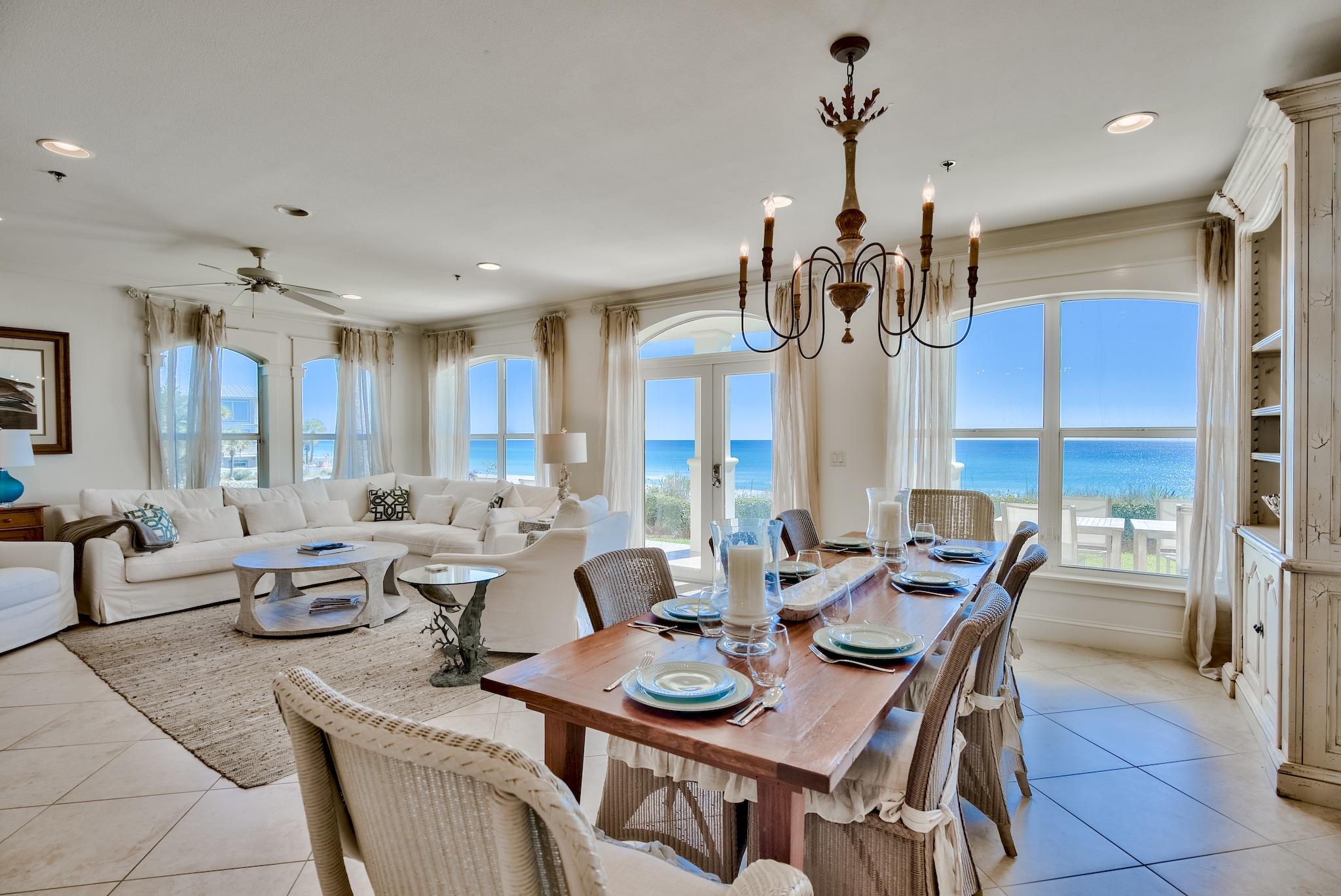 RARE OPPORTUNITY TO OWN A CONDO AT THE VILLAS AT SANTA ROSA BEACH!!! SUMMER RENTALS IN PLACE!!! This fully renovated condo has unobstructed views of the Gulf from its most desirable ground floor location. It has never been available for sale until now. Walk out of the back door of this condominium onto a gulf front patio and a lawn...a rare combination! This end unit is bathed in light from three sides. Solid surface flooring throughout, custom closets, luxurious decor, gas cooktop, and solid stone countertops are just a few of the many features. The unit has a rich rental history & can also be that perfect second home getaway for your family & friends. Do not miss the opportunity to own one of the most desirable units in one of the most sought-after developments on Scenic Highway 30A