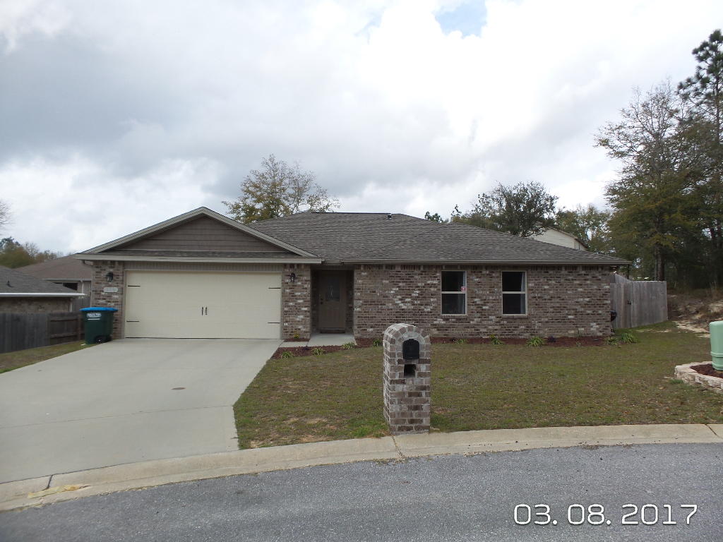 Available 05/01/2017.....Beautiful 4/2 with open concept living located in the heart of Crestview. Great curb appeal on a cul de sac with low maintenance flowerbeds. Nice foyer with tile floors in the foyer, hallway and wet areas. Newer carpet and custom paint throughout the home. Split floor plan for master bedroom privacy. Treyed ceilings, granite, stainless appliance package, upgraded lighting, so many nice upgrades make this home desirable. 2 car garage, open back patio with a pergola, yard building for yard equipment, and veggie garden box. Privacy fenced back yard and pet friendly. No inside smoking. $400 non-refundable pet fee with owner approval