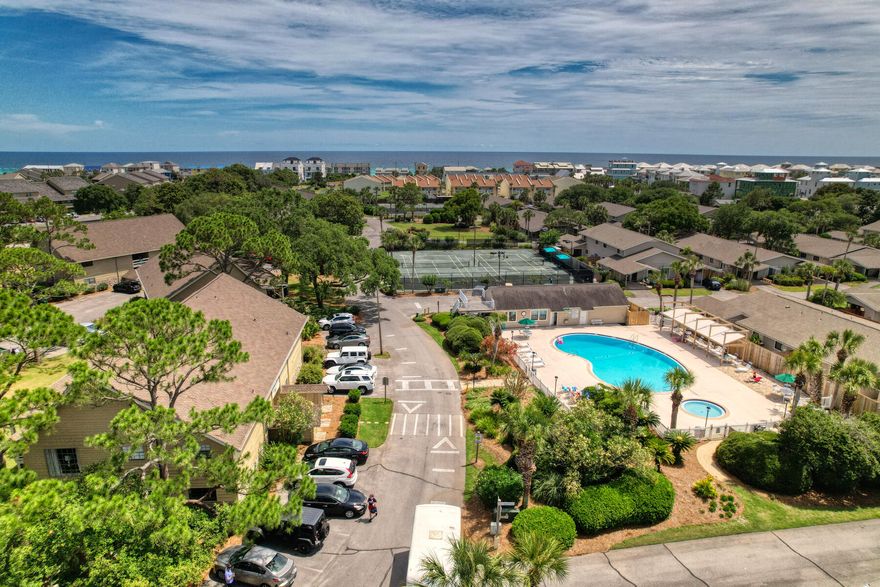 Terrific vacation rental investment, second home or full-time residence in the highly sought after Seascape Resort.  This top floor 2 bedroom 2 bath renovated condo with new doors to balcony is directly across the street from the community pool & tennis courts.  Tastefully designed kitchen features custom cabinets, wine rack, stainless appliances, & gorgeous quartz countertops. The foyer, kitchen, bedrooms, and both bath ceilings have been raised to 8 feet. Contemporary glass door showcases beautiful tile in hall bath.  Washer & dryer inside this unit, new windows & outside storage closet!  Seascape Resort has deeded beach access, pools, & 18 hole golf course.  The Seascape Towne Centre at the Hwy 98 entrance offers a variety of restaurants, entertainment & shopping. Ring system to convey.