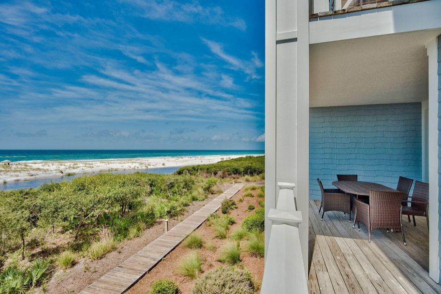 For buyers seeking a slice of heaven on earth fronting the Gulf of Mexico, this enchanting condo presents a whole new concept in low maintenance, high quality gulf-front living. The low sand dunes and sparkling gulf water views are as spectacular from this ground level unit as anything higher, and you experience the shortest boardwalk stroll to the beach. Superior craftsmanship includes reclaimed, heart-of-pine wood floors, white railings and staircase, a coastal color scheme and crown molding all highlighted by high-end Restoration Hardware furnishings. The open breakfast bar looks into a stunning kitchen with granite counters, stainless steel appliances and a coveted Viking gas range. The living and dining areas flow seamlessly to tall windows and French doors framing the glorious view.