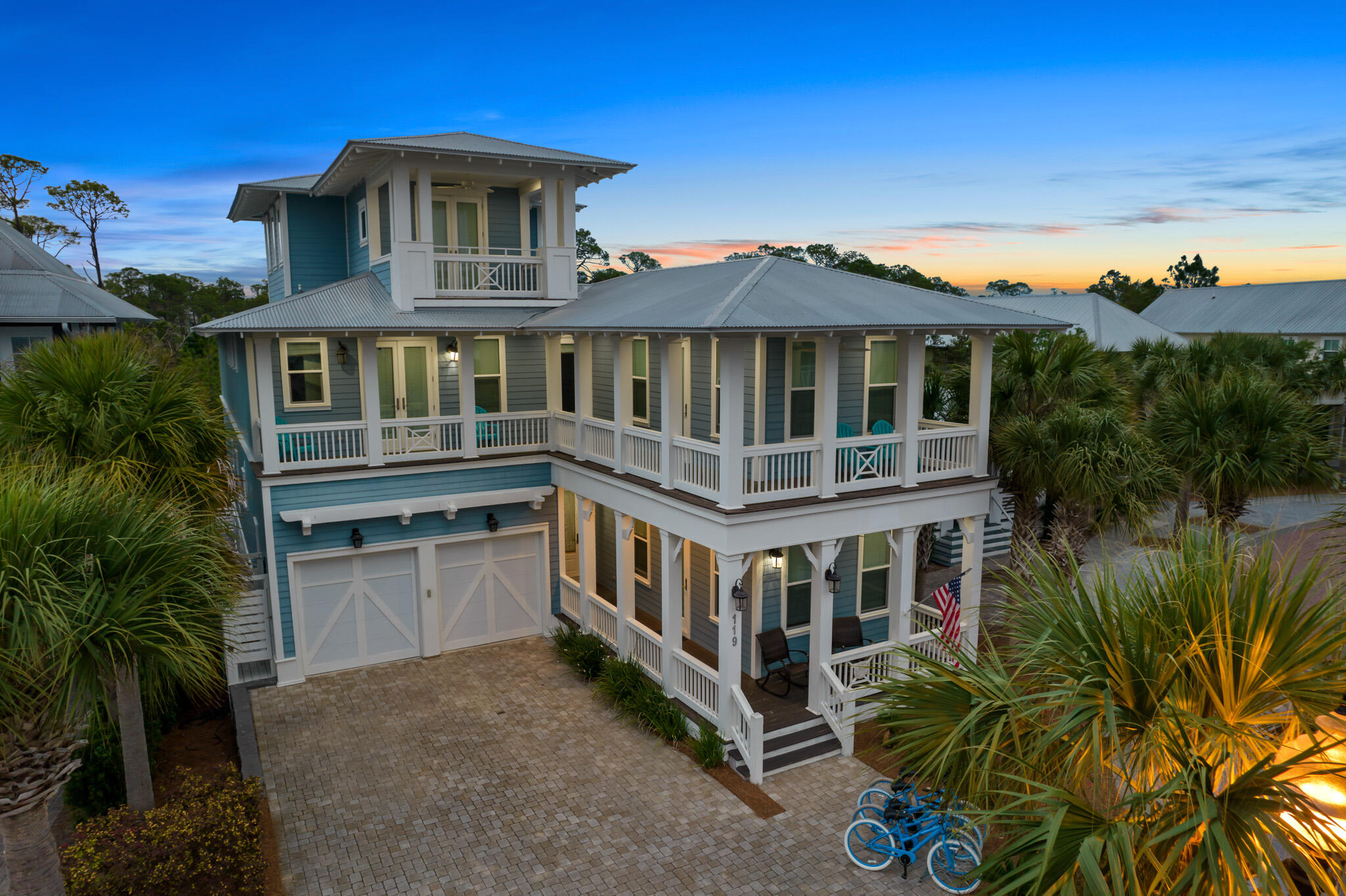 MOTIVATED SELLER! 119 Lifeguard Loop will delight with well-executed space & 7 distinct sleeping areas, with over 4,270 sq ft of interior space. Further features of this home include 2,100 sq ft of porches, 2 car garage, first floor mother-in-law suite, first floor primary suite, 2  laundry spaces, and a kitchen made for fun and entertaining (ice maker included!). This spacious home is located within the Seacrest Beach community, known for its resort-style lagoon pool, beach tram and deeded beach access. This welcoming residence is a prime opportunity for a short-term rental, second home, or a full-time option. This home was well-planned for each member of the family and even features multiple porches, an outdoor shower, game rooms and a fenced in yard. Be sure to add this to your list!