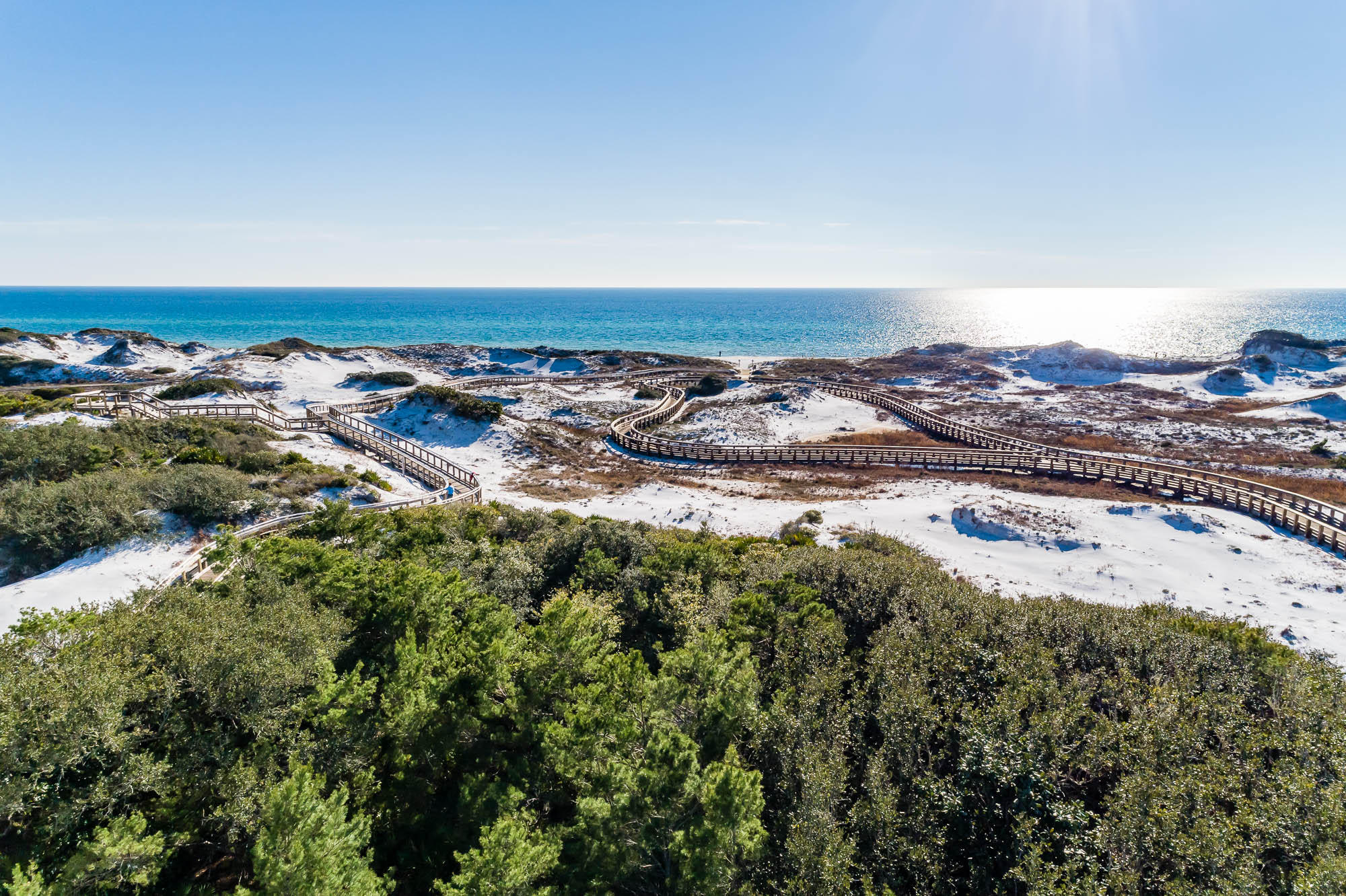 This expansive Gulf-front homesite offers breathtaking panoramic views of the Gulf of Mexico and beautiful white sand dunes, creating an idyllic setting for a dream home. Spanning an impressive 9,952 square feet, this plot provides a rare opportunity to construct the largest Gulf-front residence in the prestigious WaterSound Beach community.The homesite is conveniently adjacent to a golf cart boardwalk, ensuring easy and quick access to the stunning white sand beach. Imagine leisurely walks or rides to the shoreline, where you can enjoy the serene beauty and tranquility of the Gulf waters. WaterSound Beach offers an array of exceptional amenities designed to enhance your coastal living experience. The community features one mile of pristine, private beaches, perfect for sunbathing, swimming, and beachcombing. Residents can also enjoy a beautifully maintained swimming pool, ideal for relaxing or taking a refreshing dip on warm days.
For those who prioritize health and fitness, the community provides a state-of-the-art fitness center, equipped with modern exercise machines and facilities. Puttering Park offers a fun and engaging space for residents to practice their putting skills or enjoy casual outdoor activities.
The community is surrounded by protected woodlands and conservation areas, preserving the natural beauty and providing a peaceful environment. Scenic pathways and pedestrian bridges meander through these green spaces, offering picturesque routes for walking, jogging, or cycling.
Security is a top priority in WaterSound Beach, with 24-hour security ensuring peace of mind for all residents. Additionally, detailed plans for building on this homesite will be conveyed with the sale, streamlining the process of creating your perfect coastal retreat.
This homesite at WaterSound Beach represents a unique opportunity to build a luxurious Gulf-front home in a community that perfectly blends natural beauty, modern amenities, and security.
