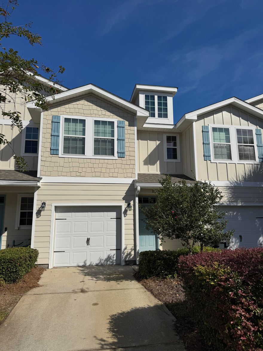 PROFESSIONAL PHOTOS COMING SOON. Spacious 3-bedroom, 2.5-bathroom townhome located just minutes from the beautiful nearby beaches. Downstairs presents a beautiful kitchen with stone countertops that opens to a generous sized living room. Upstairs, you'll find three bedrooms, including a generous primary suite featuring a large walk-in closet, a beautifully tiled shower, and a spacious bathroom with dual vanities. The secondary bedrooms are well-sized and share a conveniently located full bath. Enjoy a low-maintenance lifestyle with HOA-provided landscaping and lawn care. Conveniently situated near shopping, dining, and the area's top beaches -- this townhome offers the perfect blend of comfort, convenience, and coastal living.