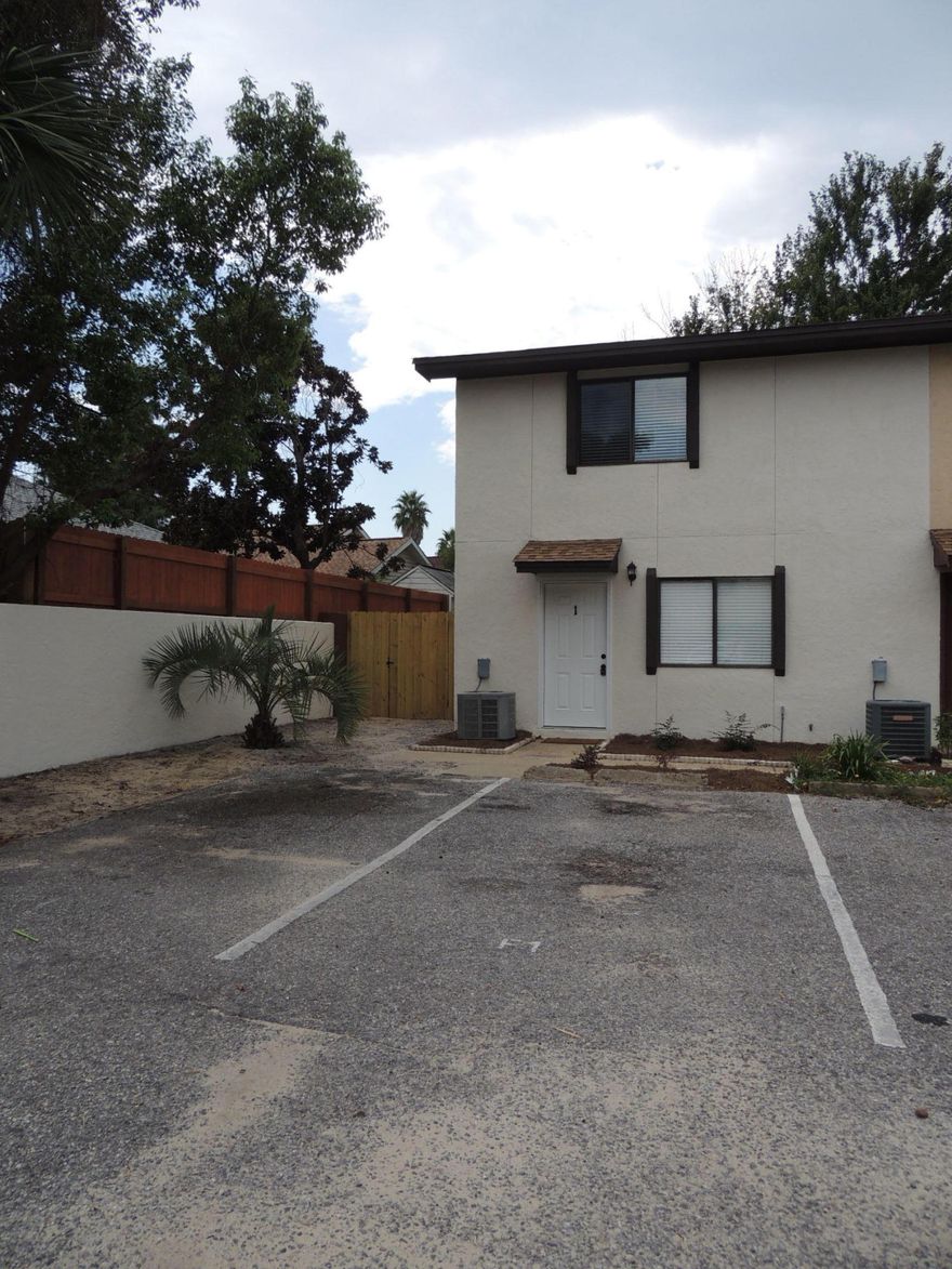 Lovely updated townhome in the heart of Destin. End unit with a privacy fenced yard. Fresh paint and carpet. Kitchen has granite counter tops, updated cabinets and stainless steel appliances as well as an open view of the living/dining area. New roof in 2017. Great investment or permanent residence. Buyer to verify all pertinent information including square footage and lot dimensions.