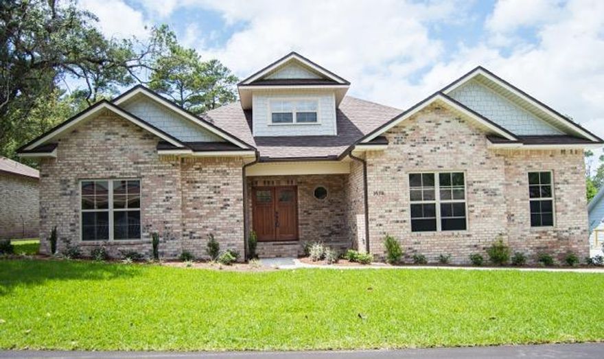 BRAND NEW HOME is now COMPLETE in the gated community of Parkwood Estates in Bluewater Bay. Located on a private lot that backs up to Fred Gannon State Park. This home features 4 bedrooms, 2.5 bathrooms on the first floor with a bonus room upstairs! The exterior of this home is all brick with hardi accents and a dimensional shingle roof. Inside this home features granite counters in the kitchen and baths. The kitchen and baths feature quality Legacy maple cabinets with soft close doors and drawers with full extension and dovetail construction. The kitchen features a slide in gas stove, microwave and dishwasher. The laundry area features a mud room with custom wood shelves and