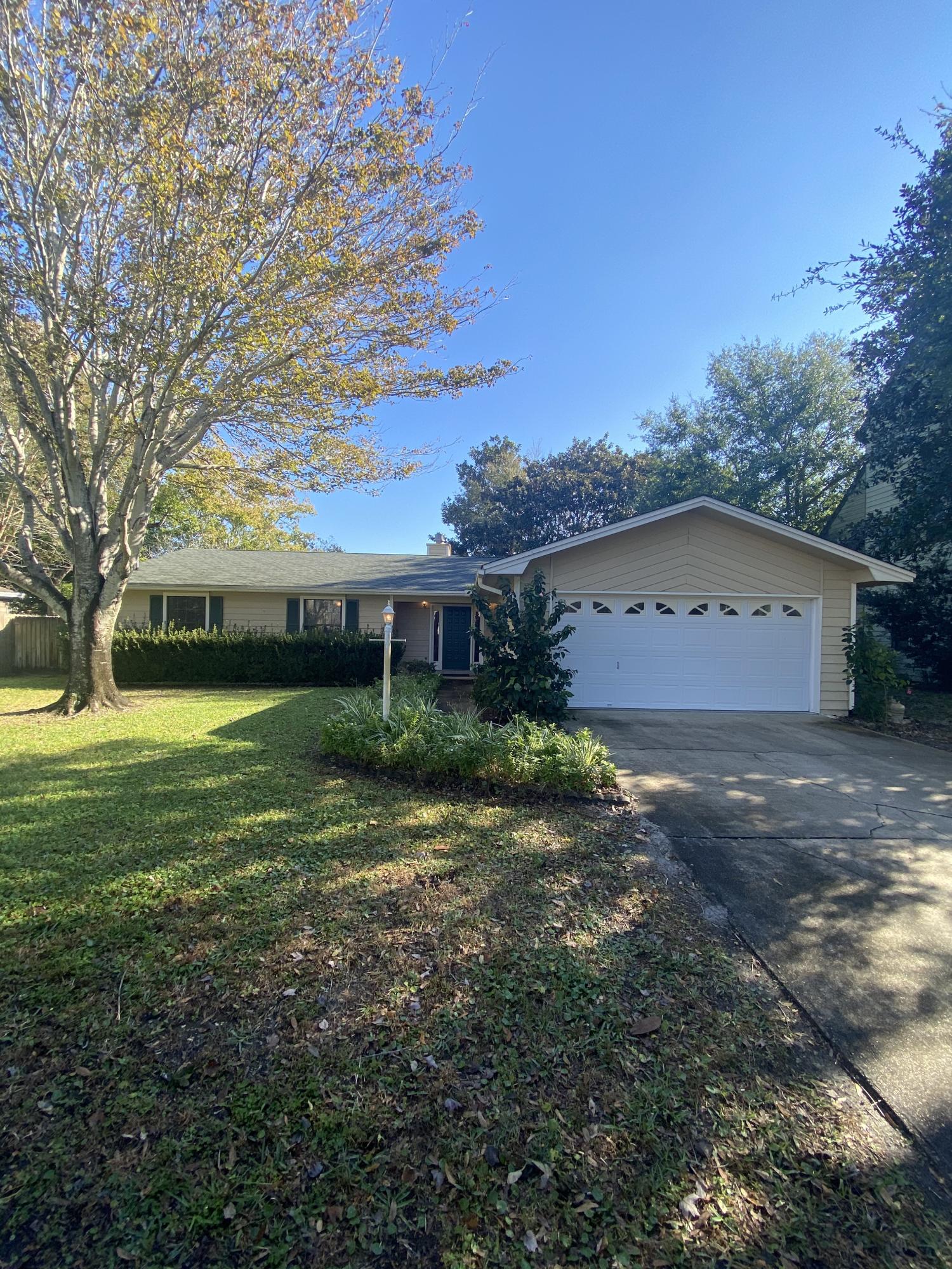 Located in the desirable Kell-Aire Neighborhood - this 3 bedroom 2 bath single family home features 2 car garage and fully fenced back yard. Close to everything Destin has to offer! Carpet in bedrooms, hardwood in living/dining/kitchen.  HVAC and Water Heater 2 years old, brand new roof, energy efficient! Don't spend weekends worrying about the yard because lawn service is included. Unit comes with washer/dryer (non warranted). Pets considered on case by case basis.