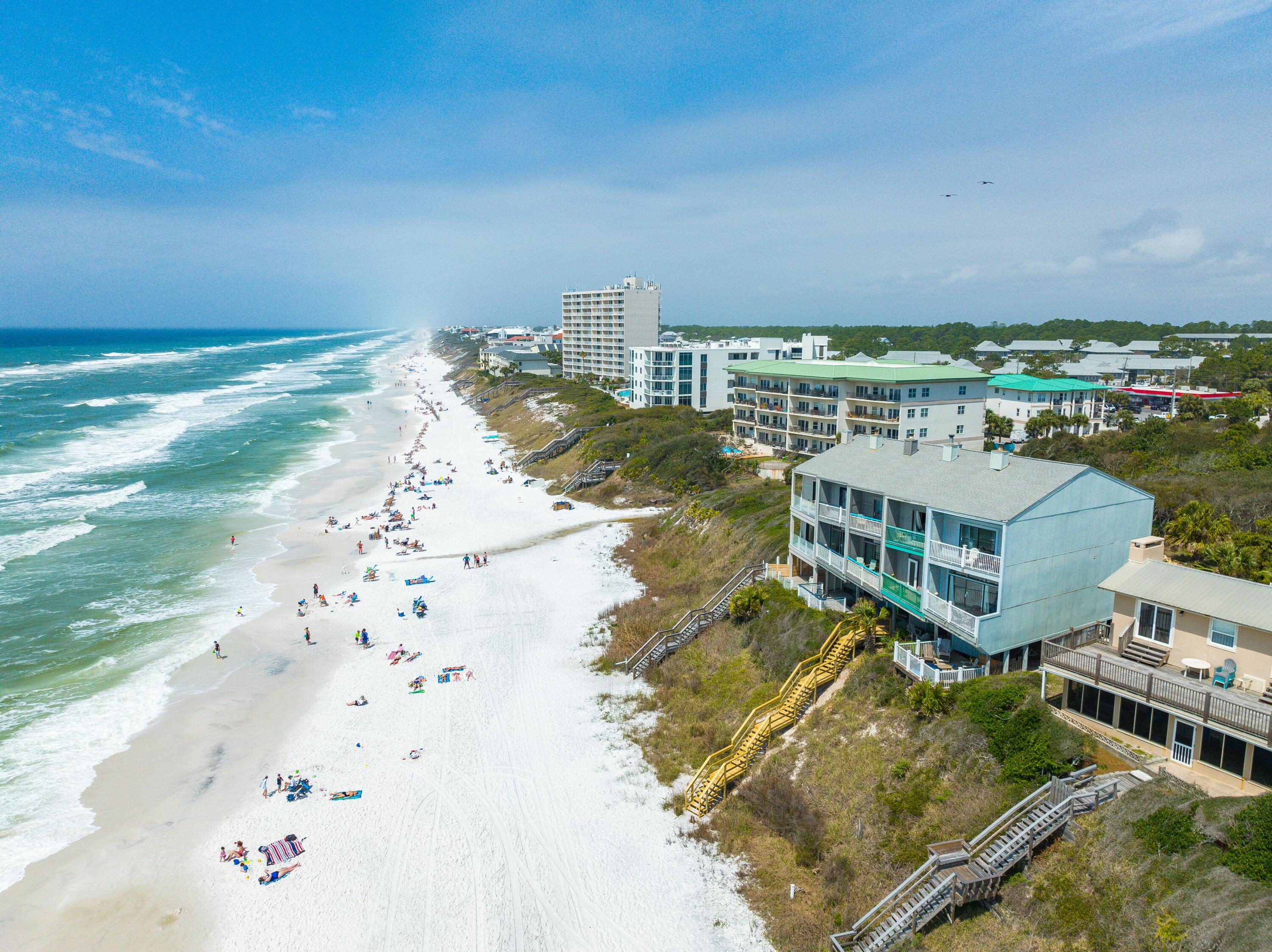 Discover your dream coastal retreat in this  gulf front townhome. Offering breathtaking views from all three levels you are just minutes away from the pristine white sandy beaches of scenic Hwy 30A. The property features two spacious bedrooms, two and one half bathrooms and the kitchen was recently updated with new cabinetry and stainless steel appliances. Located just one block south of  Hwy 30A, there is easy access to local shops, dining, entertainment, and the multipurpose path that extends for over eighteen miles along Hwy 30A.  Experience the perfect blend of comfort, style, and the serenity of coastal living. All dimensions and information are to be verified by the Buyer.