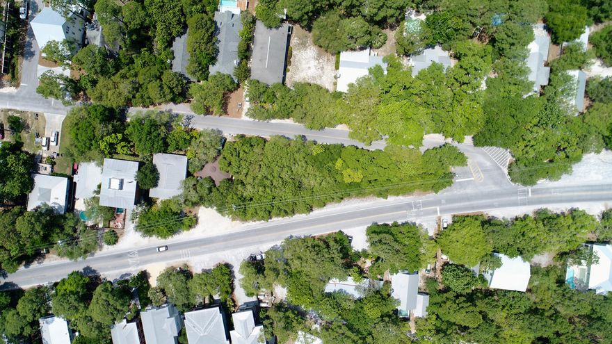 Located along Scenic Highway 30A in the heart of Grayton Beach lies this large, double-lot with ample room to build the home of your dreams. Nestled among the bungalows and hidden trails of this funky beach town, this property will be just a short walk to the Gulf, local shops and the world famous Red Bar. The expansive size of this home site may allow for a separate carriage house, or even another home to be built.The laid back way of life in Grayton Beach also comes with some pretty sweet amenities, like public access to a coastal dune lake, walkable entertainment, eateries and shops  not to mention the Gulf of Mexico. Grayton Beach is the only beach access on 30A that allows cars to drive right up onto the shores of the Gulf and set up camp  as long as you have a permit.