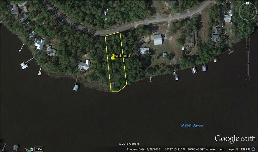 Beautiful waterfront lot on Mallet Bayou. Lots of pretty trees and excellent views. This property wont last long.
