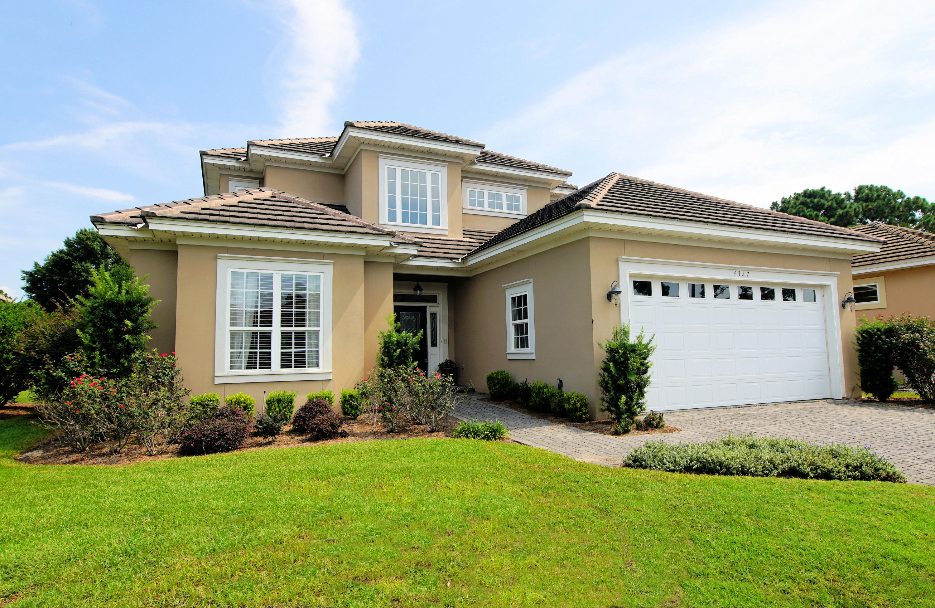 Located behind the gates of a premier golf course community, Sunset Beach is a highly sought after Bluewater Bay neighborhood with a resort style swimming pool, club house, and private access to the bay. This 3,300 sqft custom home offers 5 beds, 3 full baths, a tiled roof, 2 HVAC systems, large closets and a massive storage room over the garage. The master bedroom and one other is on the main level and 3 bedrooms are upstairs. All bedrooms are large with features. The home contains beautiful natural light, many built-ins, rounded sheet rock corners, gas fireplace, and crown molding throughout entire home. One upstairs bedroom has its own balcony with French doors. The lower patio is plumbed with natural gas for BBQ. There is a whole home vacuum system, water filtration and alarm system.