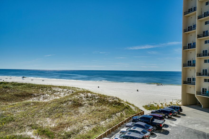 ''CURRENTLY UNDER CONTRACT, SELLER ACCEPTING BACKUP OFFERS.'' Wake up to Direct Views of beautiful Lake Powell off your Master Bedroom balcony, then have coffee with breathtaking direct views of The Gulf off your large living room balcony!!  This condo will make a great short term rental or full time residence, complete with Rare Deeded Parking Space! Super Short distance to walk on beach access, Over 1/4 Mile of Beach Frontage, Large Gulf Front Indoor/Outdoor Heated Pool (two total), Sauna, Fitness, Library, Boat docks, Boat Trailer parking, Tennis, In Unit Washer/Dryer, and more.  Pinnacle Port is tucked nicely inside gated Carillon Beach community, on the edge of 30A! With minor updating, this Beach Front Condo will make new owners Beach Happy! Buyer/Buyer's agent to confirm all info.