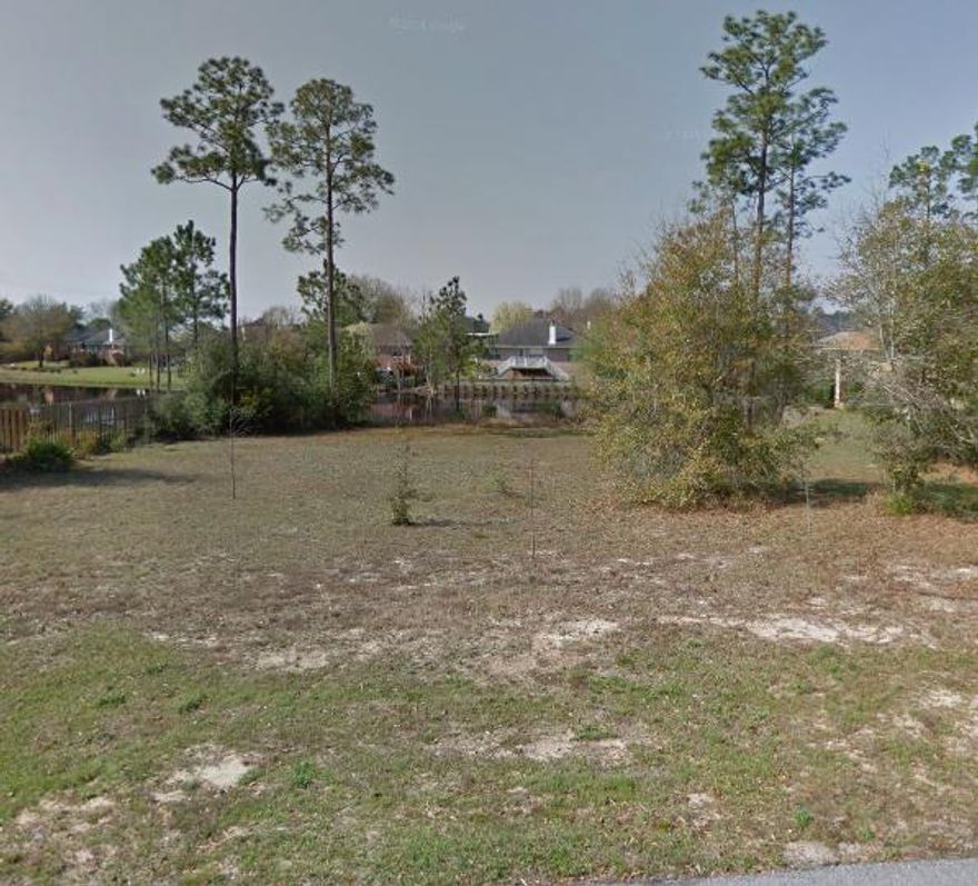 .33 acre lot on a lake in Crestview within a well maintained subdivision. Bring your builder and build your dream home!