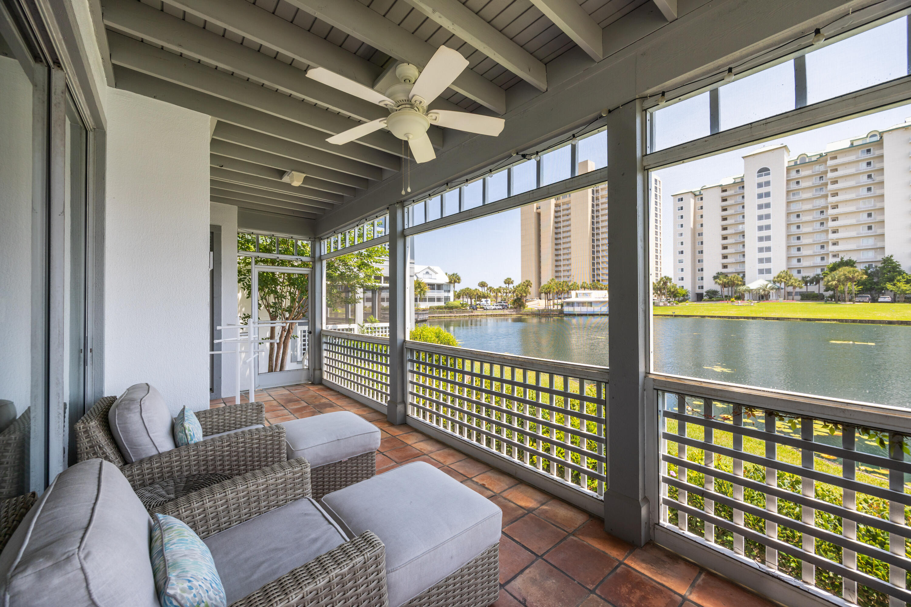 Discover an unparalleled opportunity to own Hidden Dunes Beach Villa #34, a premier lakefront retreat priced at $849,000. One of only 42 exclusive villas in this coveted subdivision, the front-row gem rarely becomes available. Nestled within the prestigious gated beachside community of Hidden Dunes Beach and Tennis Resort, this single-level, move-in-ready villa boasts a spacious 3-bedroom, 3-bathroom open-concept layout. The wraparound screened-in porch, overlooking the serene lake, offers the perfect setting for savoring breathtaking sunsets. Step inside to find a meticulously maintained home, fully furnished with a chef's kitchen featuring natural gas cooking, remodeled bathrooms, elegant tile flooring, and fresh neutral paint. The care and pride of its long-term owner is evident making this villa a true coastal sanctuary. Enjoy exclusive access to world-class amenities, including over 500 feet of private deeded beach, two sparkling pools (one seasonally heated), a hot tub, gas grills, a fishing pier, basketball court, shuffleboard, and a playground. The renowned onsite tennis and pickleball facility features five Rubico tennis courts, five pickleball courts, a pro shop, and professional coaching, with homeowners enjoying significantly discounted court rental rates. Ideally positioned, Villa #34 offers unmatched proximity to the heated pool, gas grills, and fishing pier, with the private beach just a leisurely 3-minute stroll away. Spanning 27 acres with only 316 residences, Hidden Dunes is celebrated for its low-density, family-friendly atmosphere and pristine private beach.
Don't miss this rare chance to own a slice of coastal elegance. Schedule your private tour today and experience the unmatched charm of Hidden Dunes Beach Villa #34!