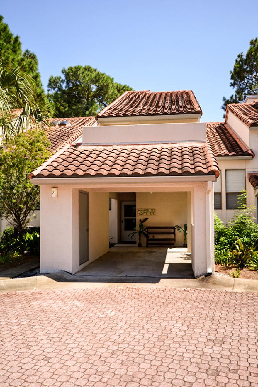 This lovely Tennis Village condo is nestled in the midst of the exclusive gated community of TOPS'L BEACH & TENNIS RESORT. This affordable 1293 sqft 2 bedroom 21/2 bath unit lives large with a downstairs open concept floor plan that is home to the kitchen, dining, living areas as well as a -1/2 bath and laundry area so you can enjoy the cozy fireplace with built-in shelving, high ceilings with lots of natural light, a sliding glass door that opens to the patio. Retreat upstairs to the second level to your private Master Bedroom/Bath with outside deck area overlooking the tennis courts. The 2nd bedroom/bath is also located upstairs and has it's own private balcony. THIS UNIT IS OFFERED FURNISHED so all you need is your swimsuit, tennis racquets and walking shoes! Enjoy the abunda