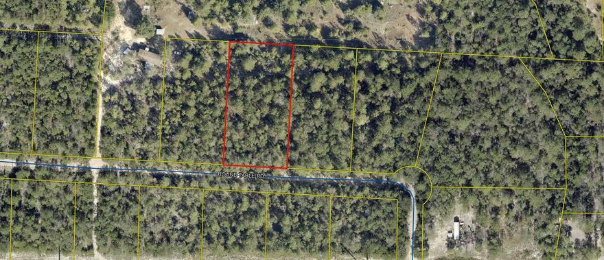 Discover the freedom to build your dream on this beautiful one-acre parcel of vacant land. With no utilities currently on site, this property is ideal for those seeking an off-grid lifestyle, a peaceful retreat, or a long-term investment. The lot is mostly level and lightly wooded, offering a natural setting and endless potential. Located in a quiet rural area but still within driving distance to town, shopping, and major roads, you get the best of both worlds--privacy and accessibility. Whether you're planning to build, hold for the future, or enjoy recreational use, this blank canvas is ready for your ideas. Buyer to verify  utility options.