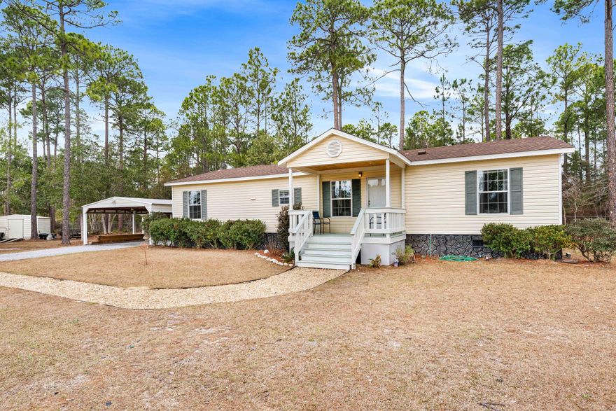 Awesome setting in Freeport, Florida at the end of a cul-de-sac. Home sits on .6+acre lot.  This home is in the Black Creek area and very close to boat launches for the fisherman in your life.  The home has double insulation on all walls, floors and ceilings... Windows are all Thermal pane insulated double hung.   Double carport and guest quarters (12' x 24').Shed is insulated, has recessed lighting and acoustic ceiling tile, may be used for workshop, home-office, studio; wired for cable, has a window unit a/c and bath w shower.