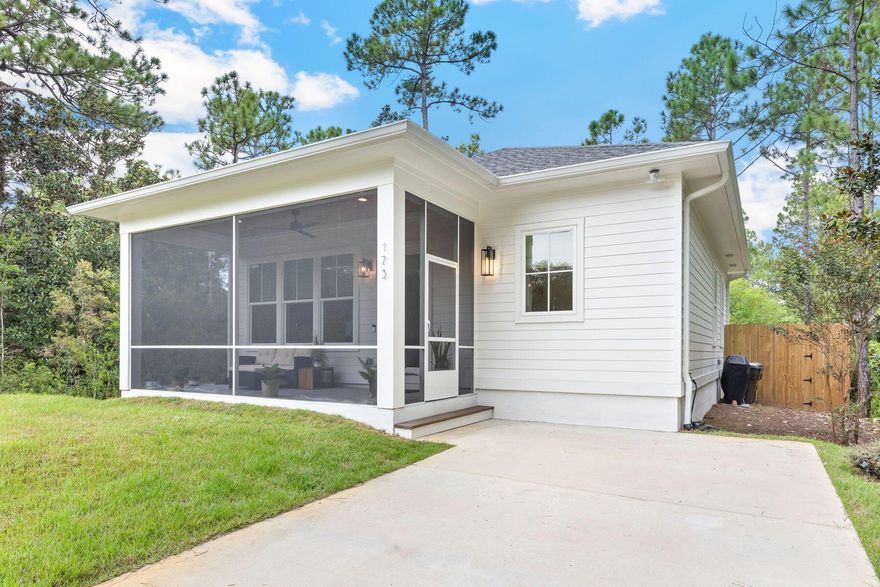Tucked away on an end of street location in Santa Rosa Beach, this coastal-inspired home blends privacy, comfort, and style. With 1,050 square feet of thoughtfully designed living space, the open layout, vaulted ceiling, and sunlight streaming through windows and glass doors create a welcoming feel. The home offers two spacious bedrooms and two full bathrooms, with the primary bedroom featuring an ensuite bath, providing comfort and convenience for both residents and guests. A screened porch and fenced backyard invite you to enjoy the Florida lifestyle, whether relaxing with a morning coffee, entertaining friends, or creating a private outdoor retreat. Flooring, cabinetry, tile selections and custom trim work reflect the high-end design of the 30a area. With its refined finishes, serene setting, and versatile design, this property is not only an inviting primary residence but also a smart investment opportunity. Ideal for long-term rental income the home captures the essence of coastal living.

